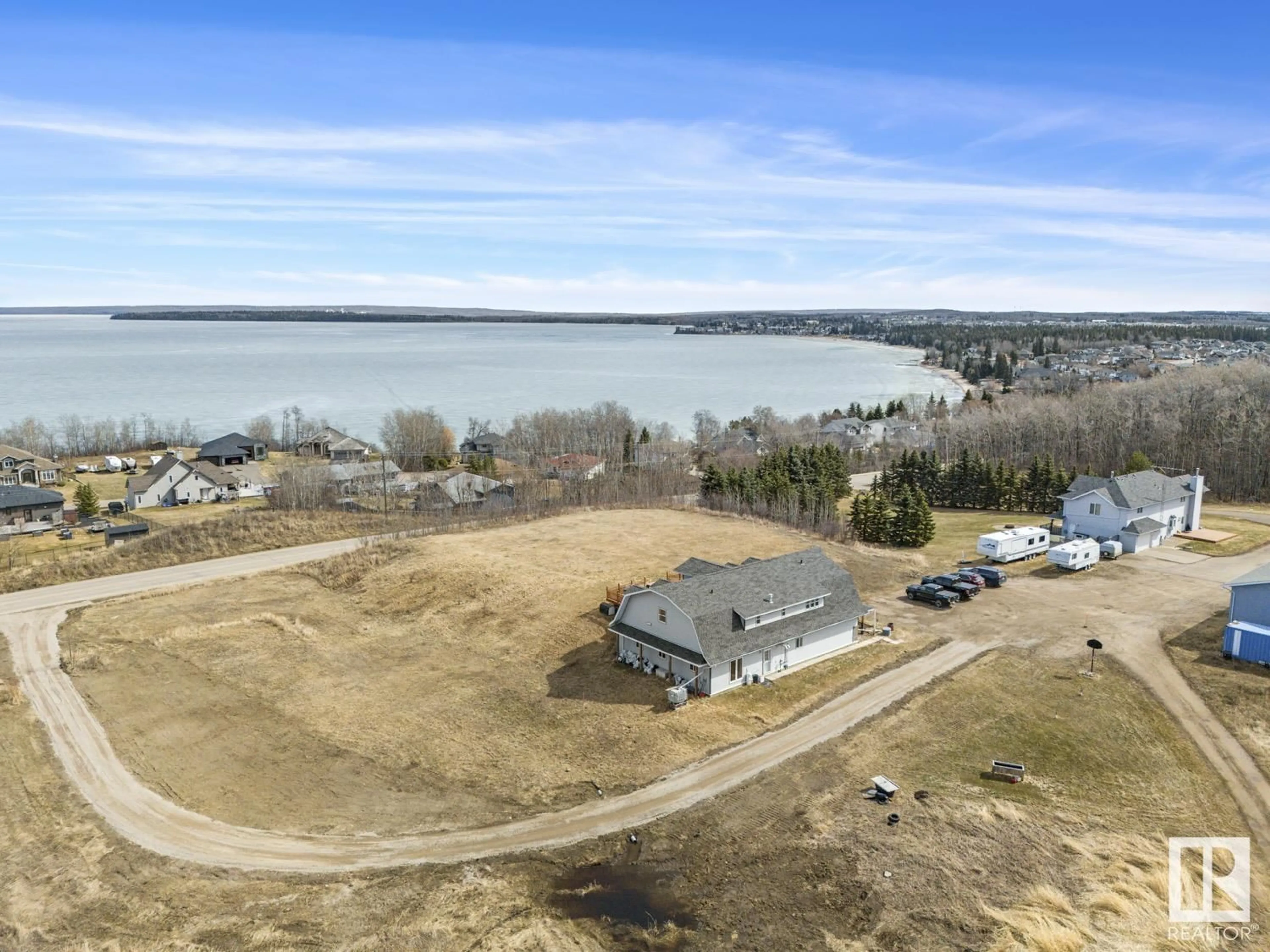 A pic from outside/outdoor area/front of a property/back of a property/a pic from drone, water/lake/river/ocean view for 1305 28 ST, Cold Lake Alberta T9M1G2