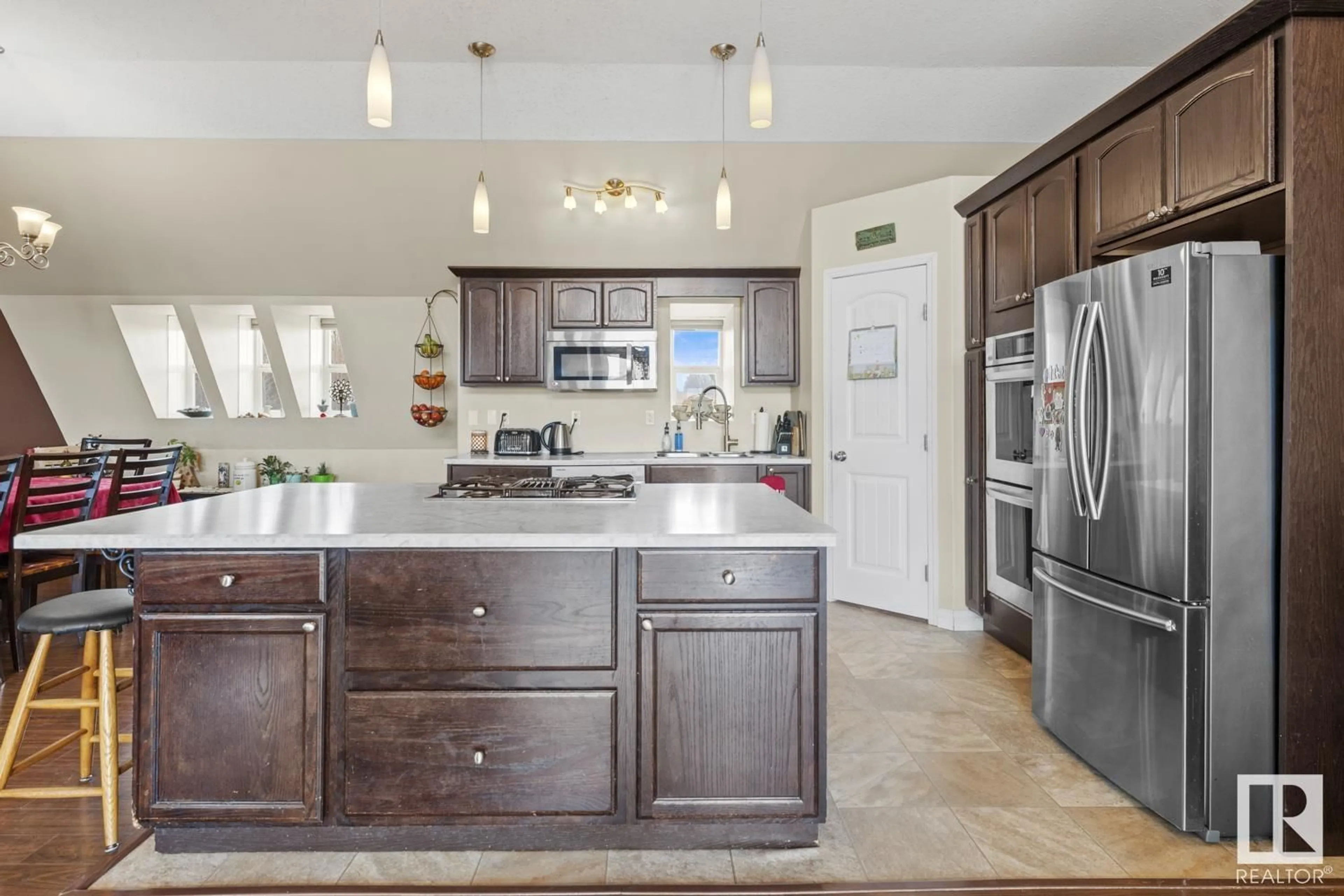 Open concept kitchen, ceramic/tile floor for 1305 28 ST, Cold Lake Alberta T9M1G2