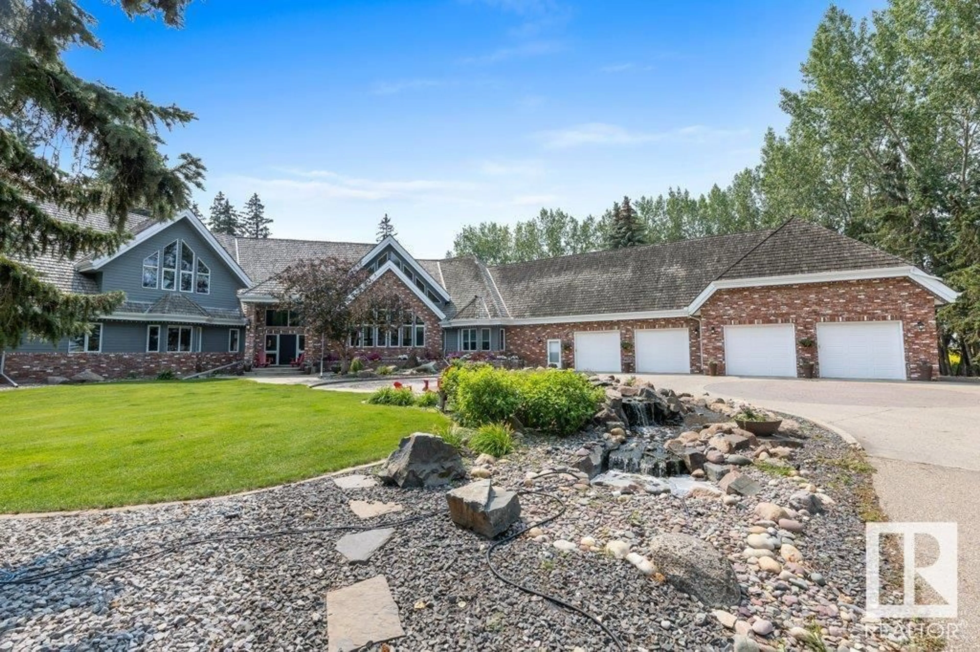 A pic from outside/outdoor area/front of a property/back of a property/a pic from drone, mountain view for 54020 RGE RD 261, Rural Sturgeon County Alberta T8T0C1