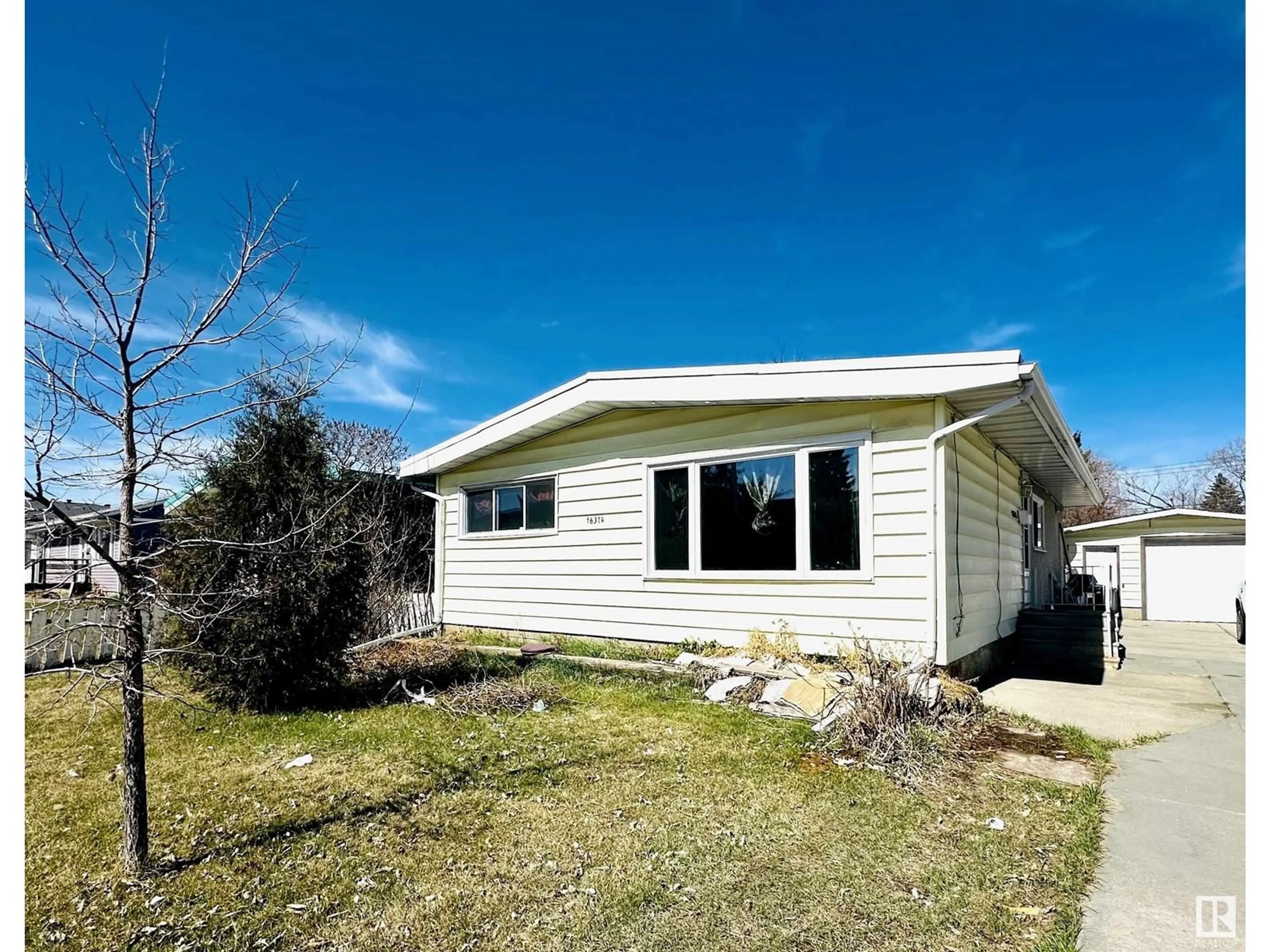 Home with vinyl exterior material, street for 16314 96A AV, Edmonton Alberta T5P0E5