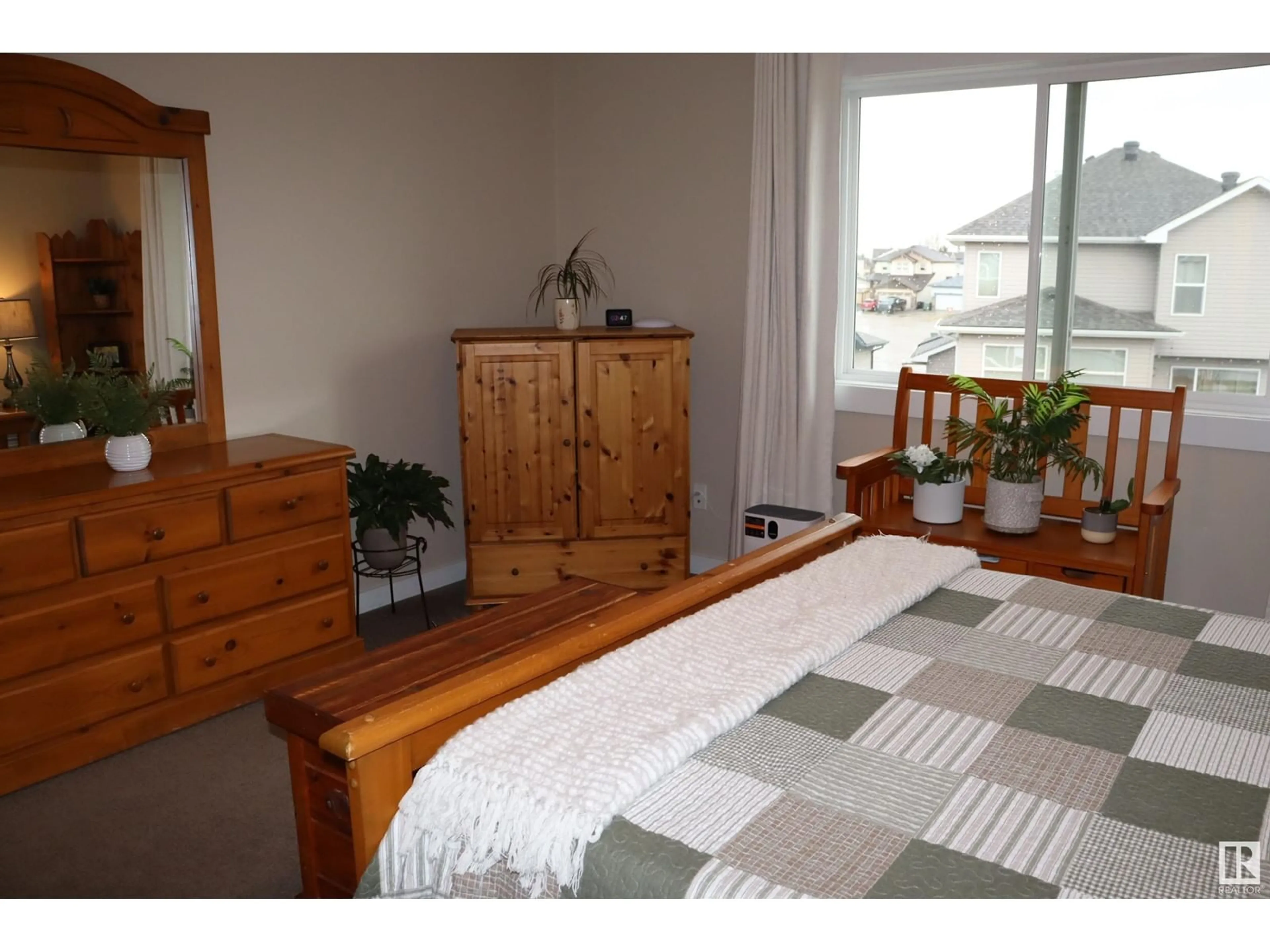 Bedroom with bed, wood/laminate floor for 277 SHEPPARD CIRCLE, Leduc Alberta T9E0T5
