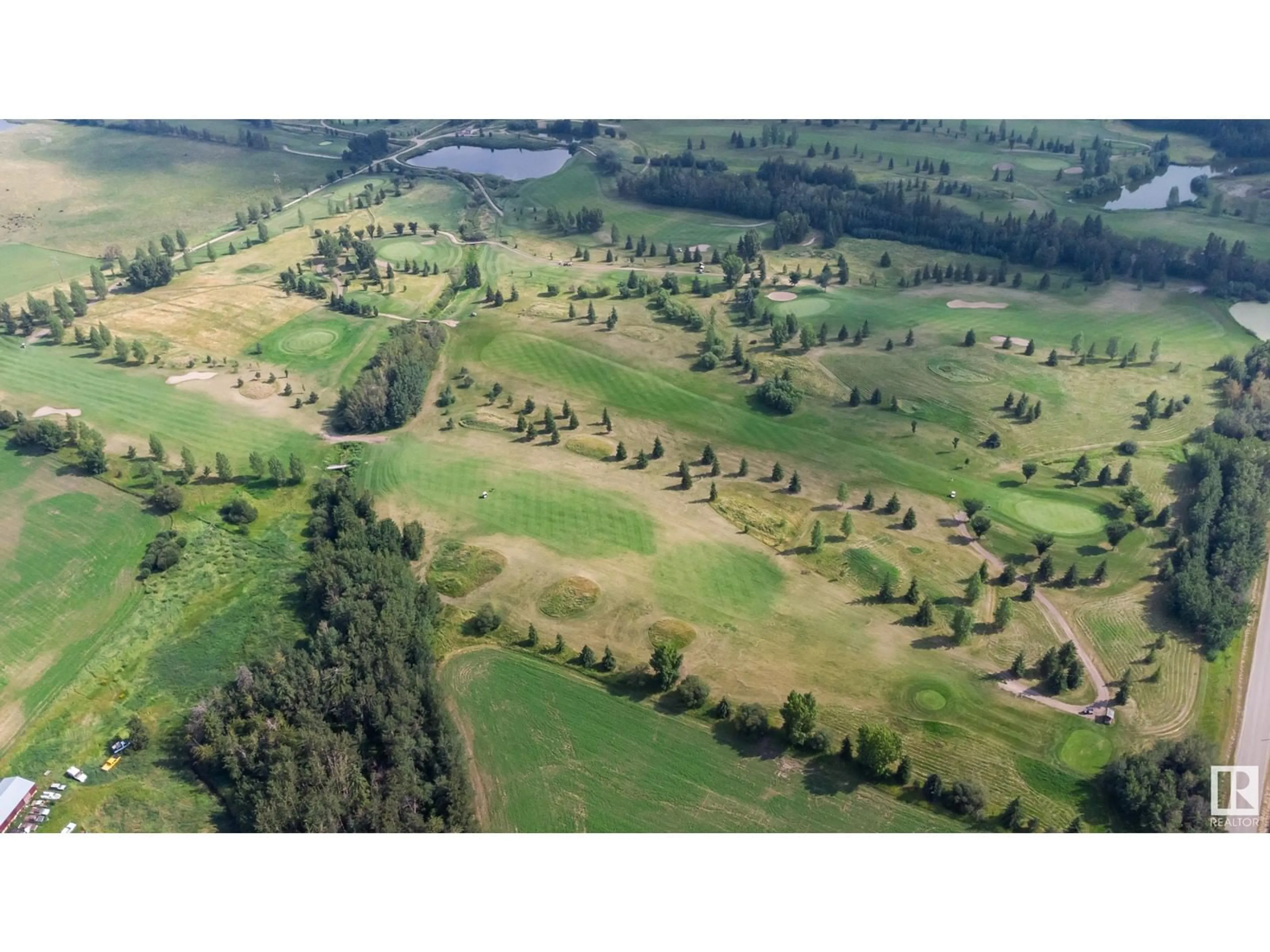 A pic from outside/outdoor area/front of a property/back of a property/a pic from drone, forest/trees view for 51539 RGE ROAD 232 A, Rural Strathcona County Alberta T8B1L1