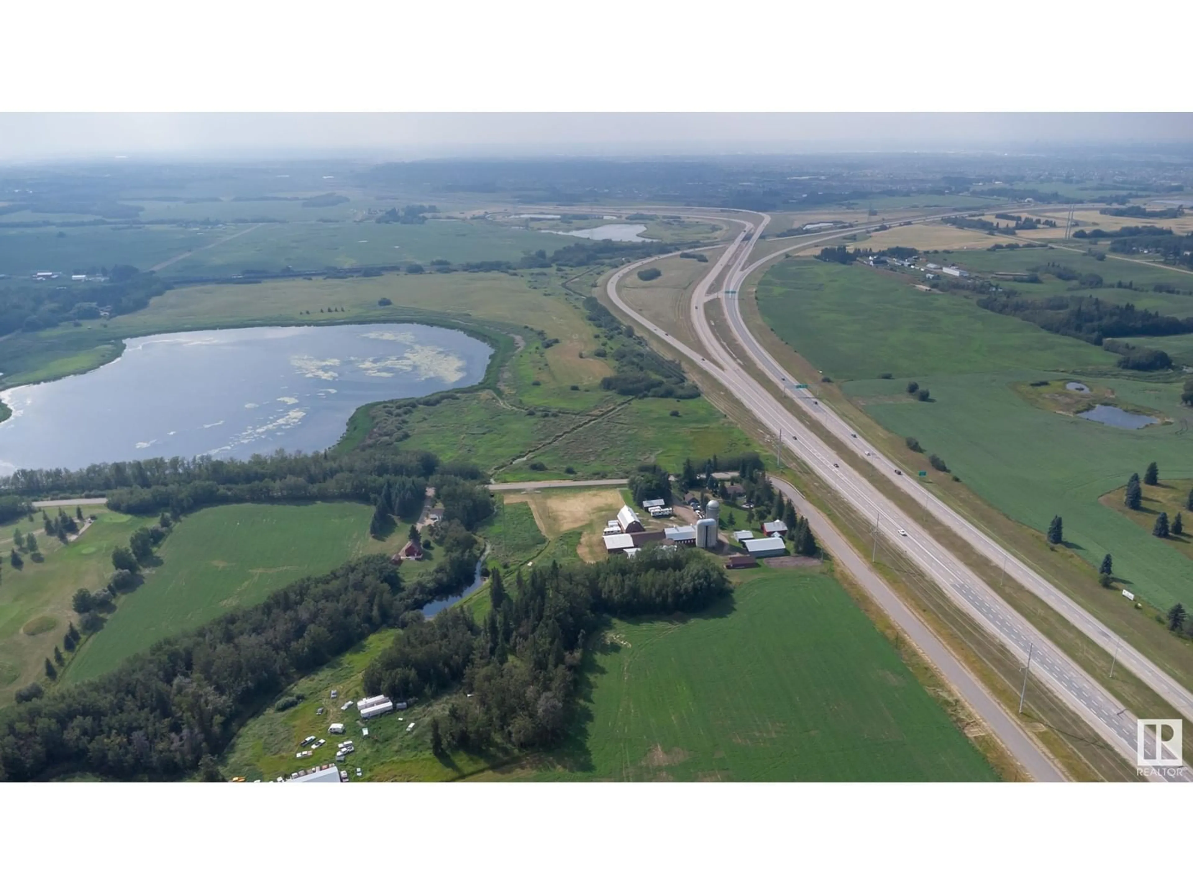 A pic from outside/outdoor area/front of a property/back of a property/a pic from drone, unknown for 51539 RGE ROAD 232 A, Rural Strathcona County Alberta T8B1L1
