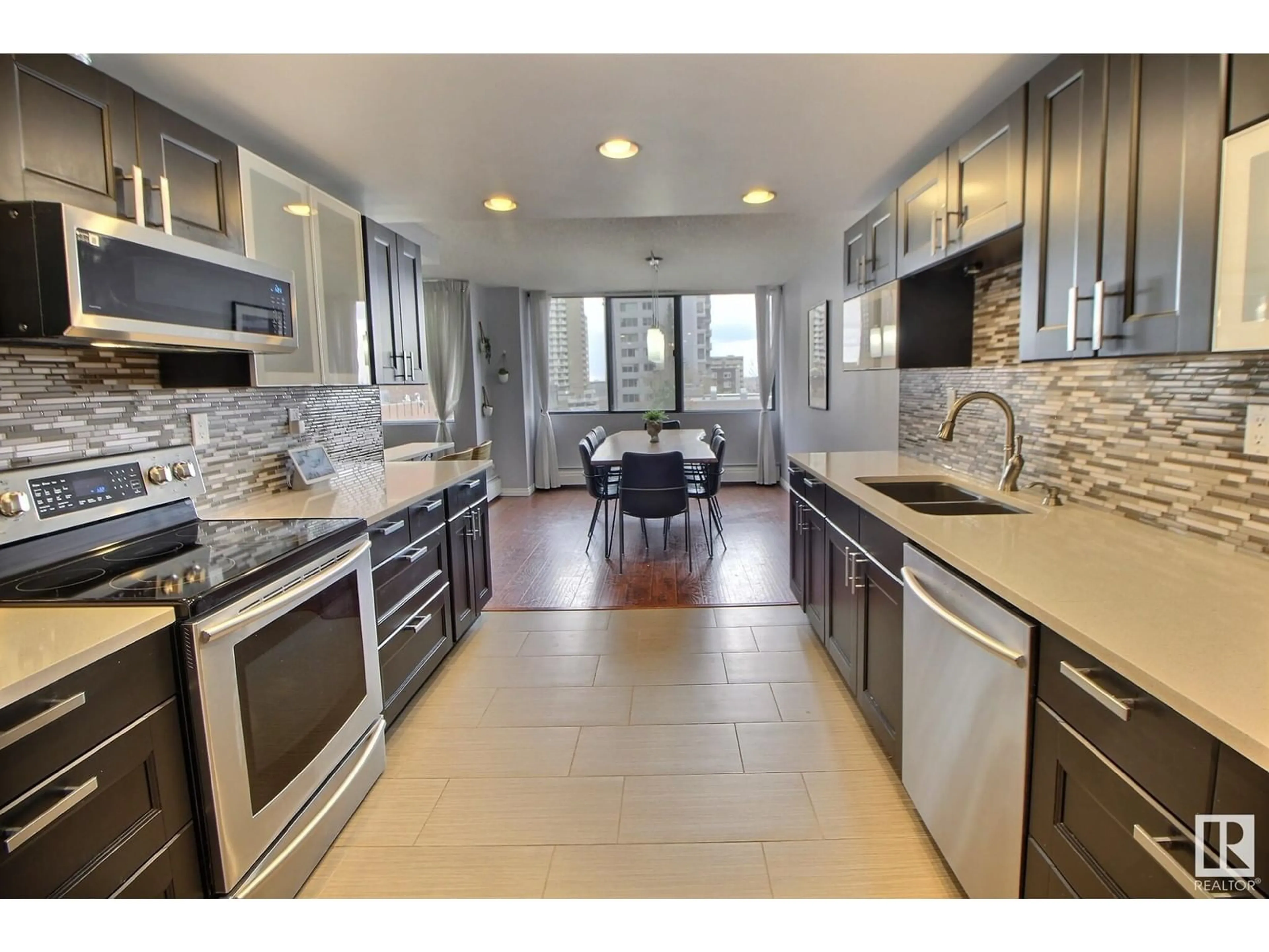 Open concept kitchen, ceramic/tile floor for #204 - 9921 104 ST, Edmonton Alberta T5K2K3