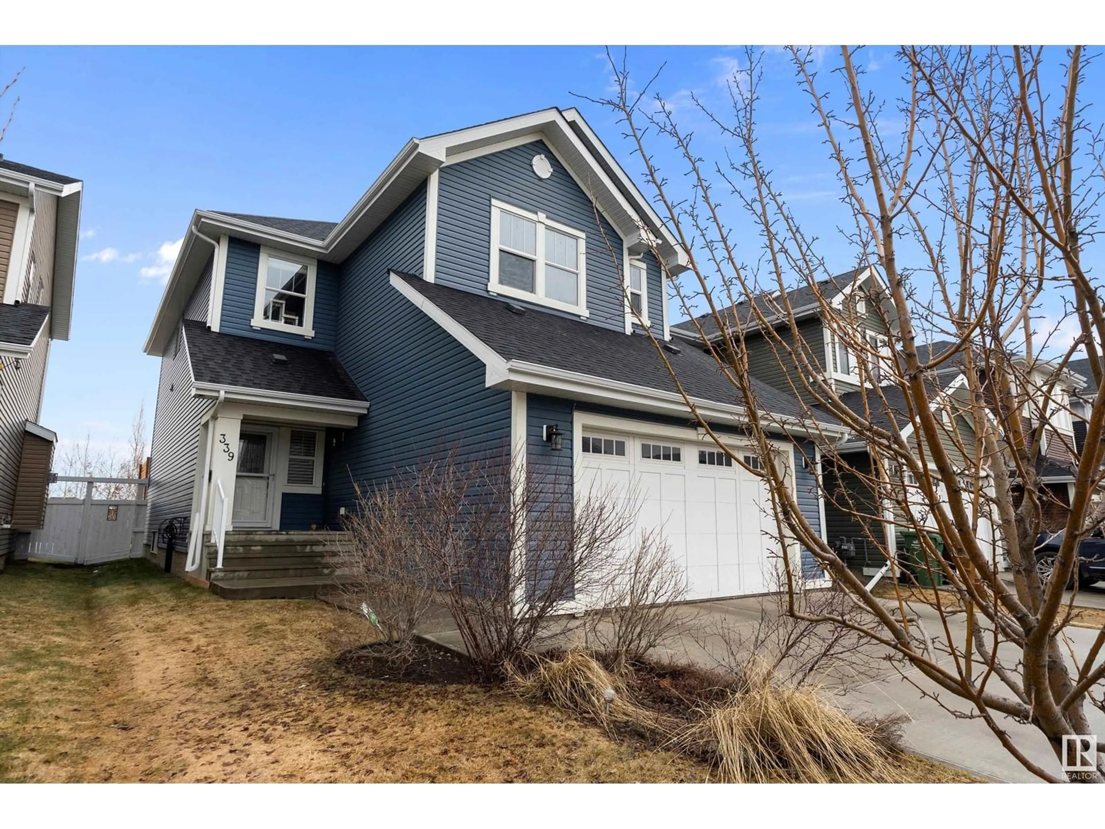 Home with vinyl exterior material, street for 339 SIMPKINS WD, Leduc Alberta T9E1B9