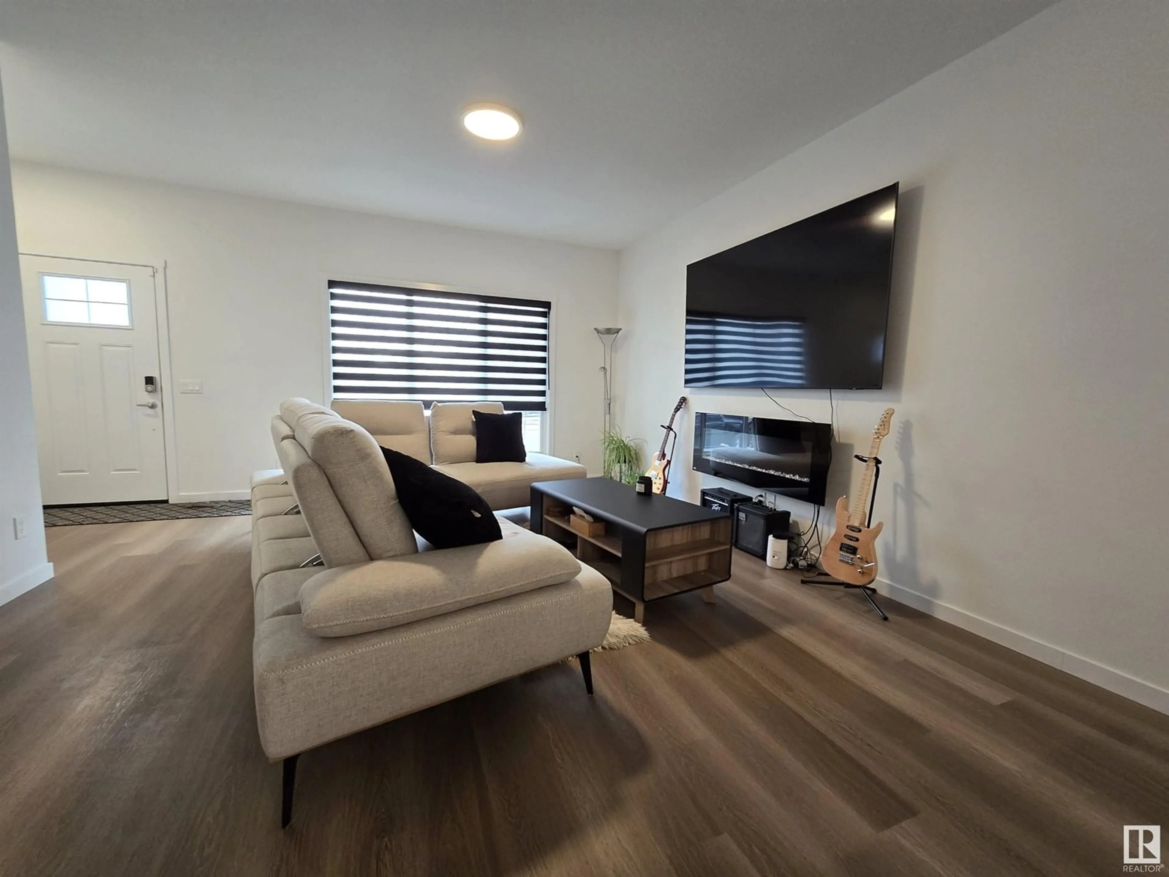 Living room with furniture, wood/laminate floor for 456 EDGEMONT DR, Edmonton Alberta T6M1S1