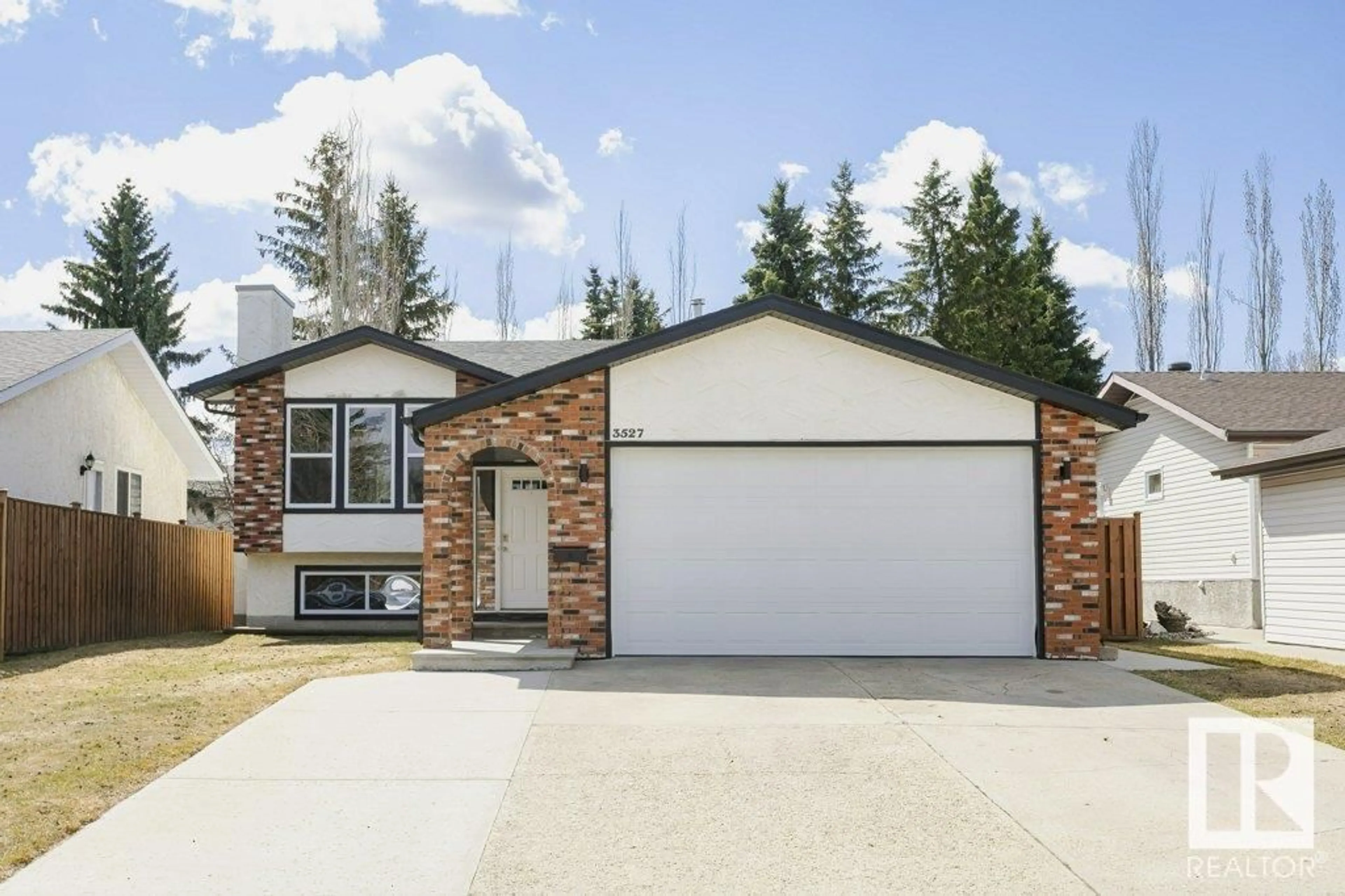 Home with vinyl exterior material, street for 3527 13 AV, Edmonton Alberta T6L2M1