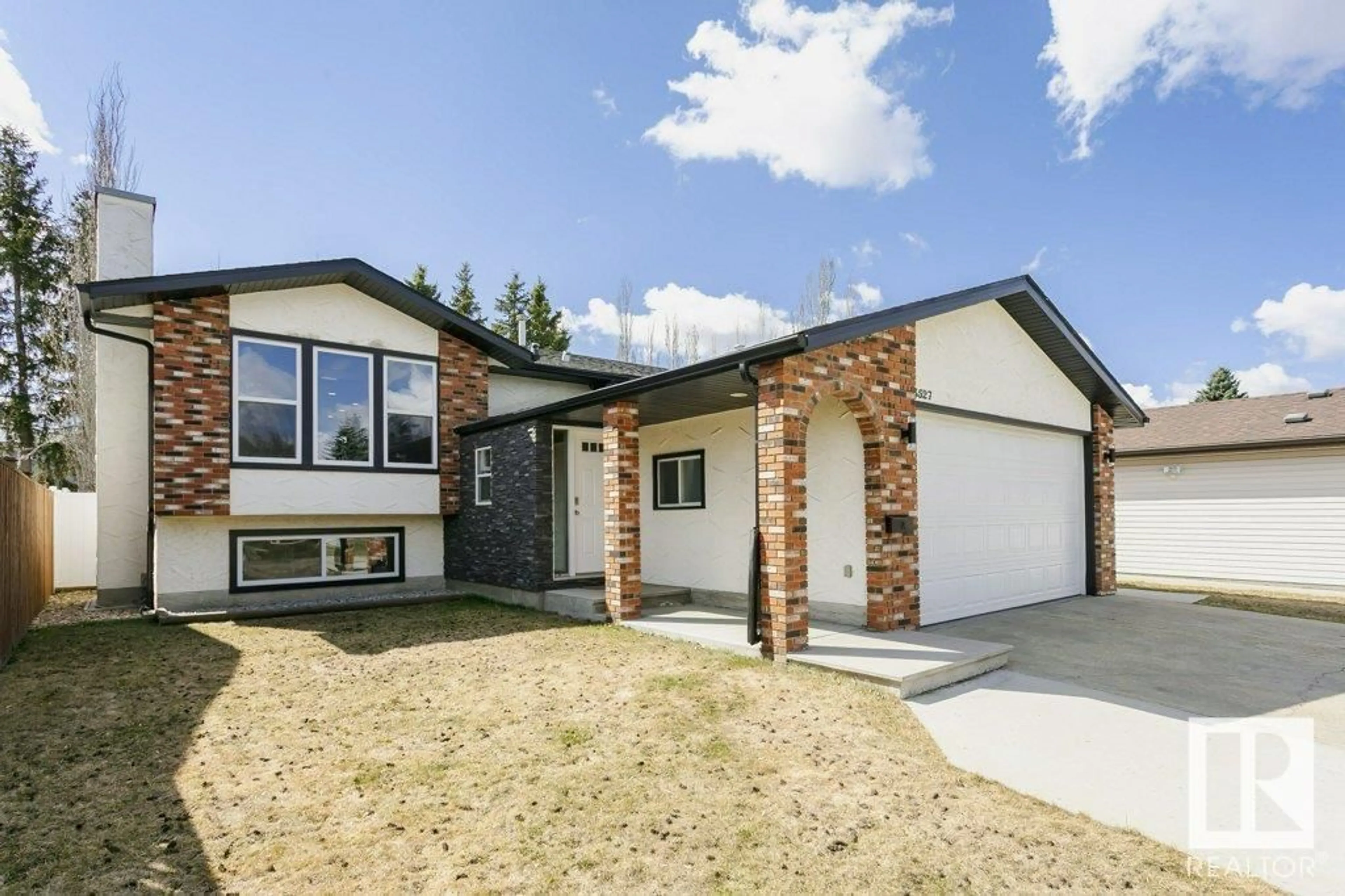 Home with vinyl exterior material, street for 3527 13 AV, Edmonton Alberta T6L2M1