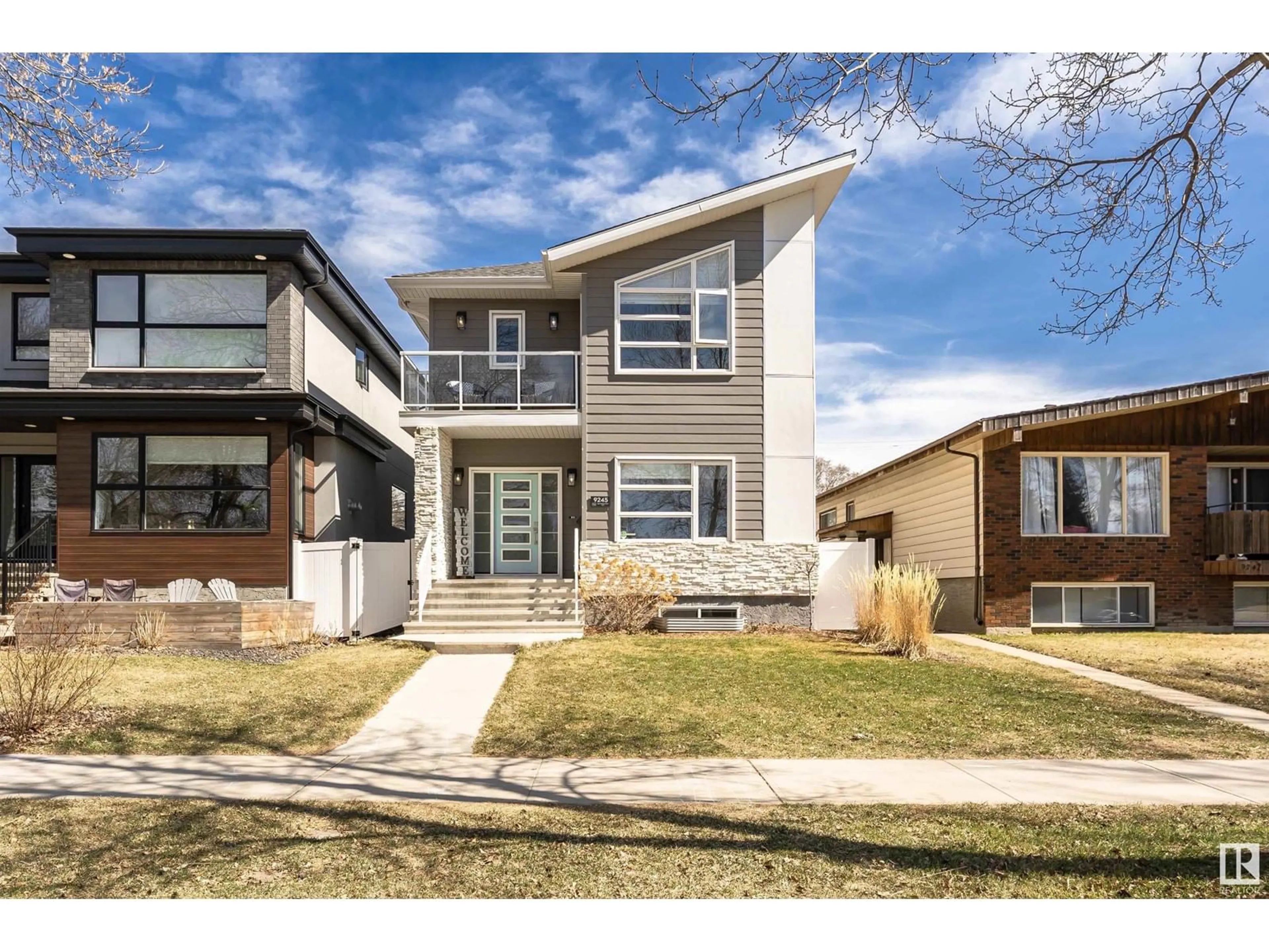 Home with vinyl exterior material, street for NW - 9245 93 ST, Edmonton Alberta T6C3T5