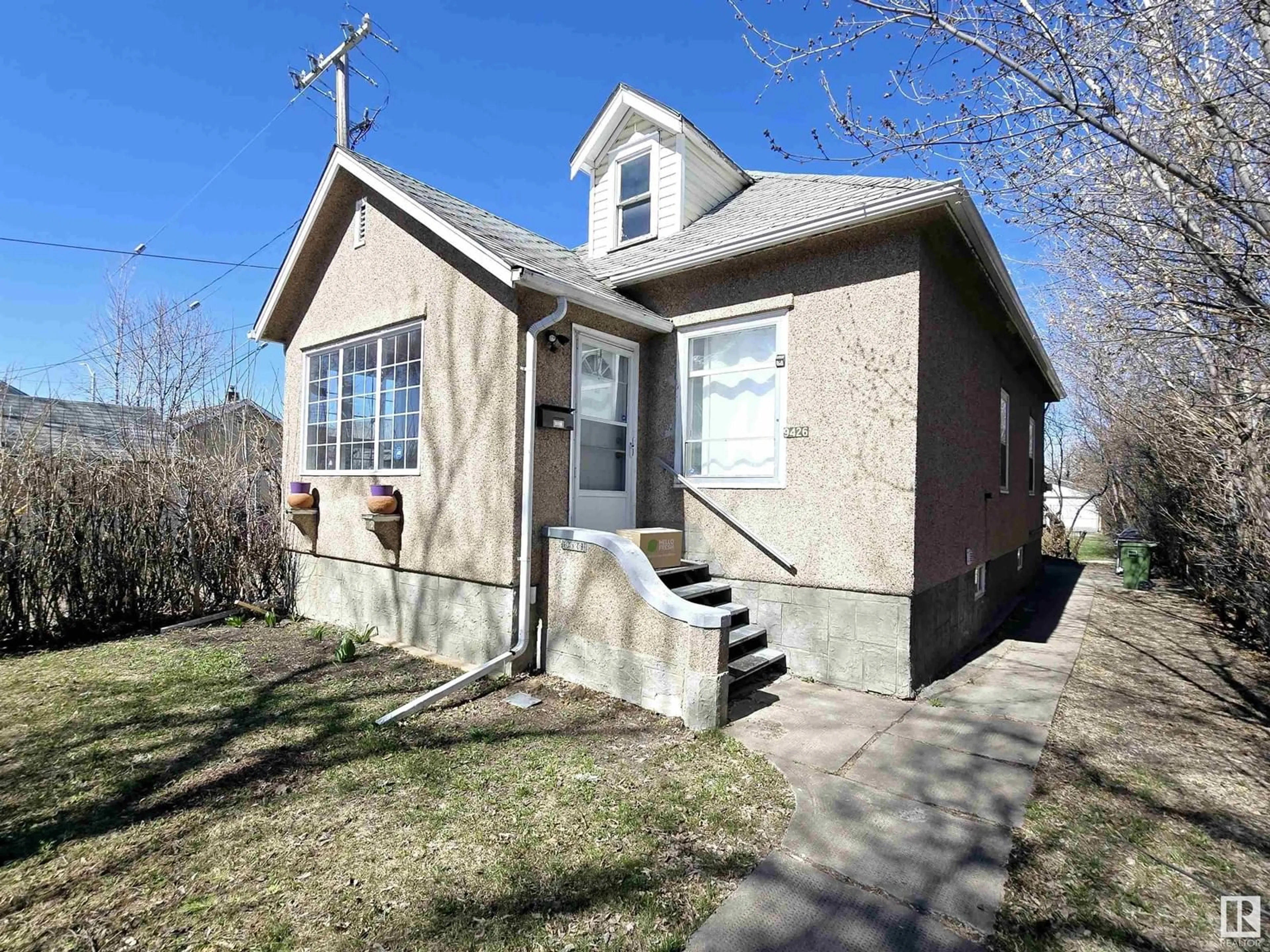 Home with brick exterior material, street for 9426 109A AV, Edmonton Alberta T5H1E8