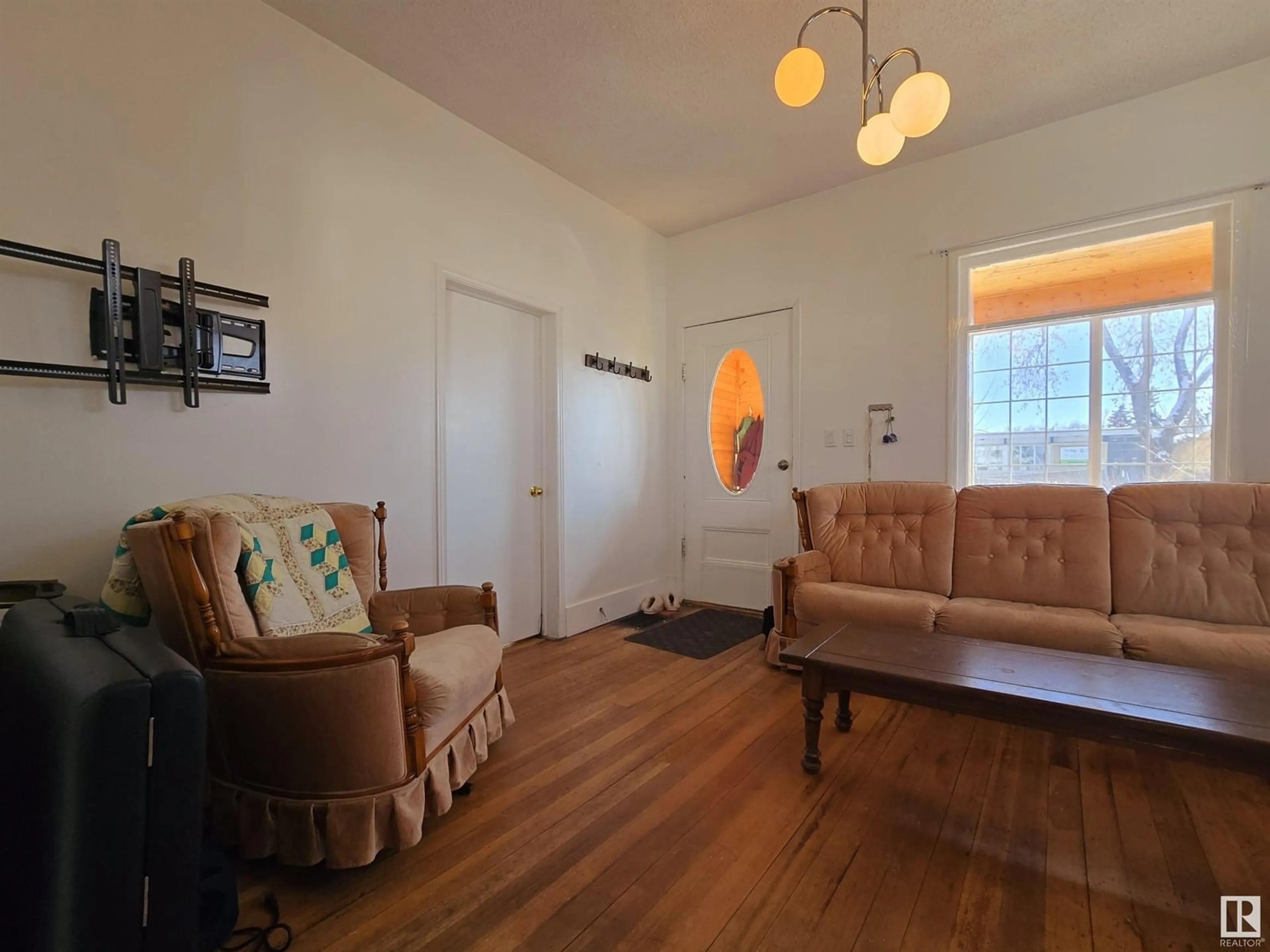 Living room with furniture, unknown for 9426 109A AV, Edmonton Alberta T5H1E8