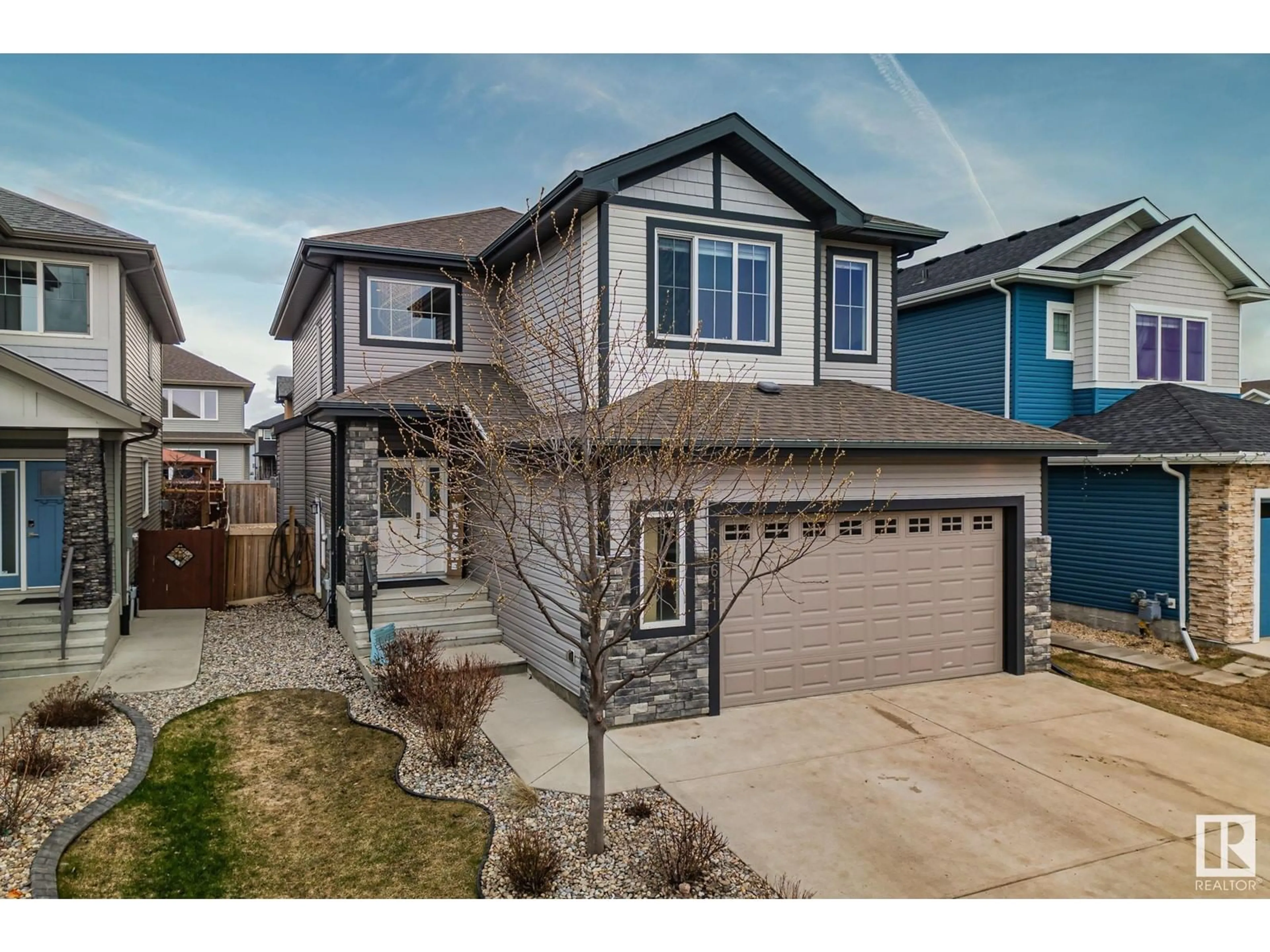 Home with vinyl exterior material, street for 6611 54 AV, Beaumont Alberta T4X2A2