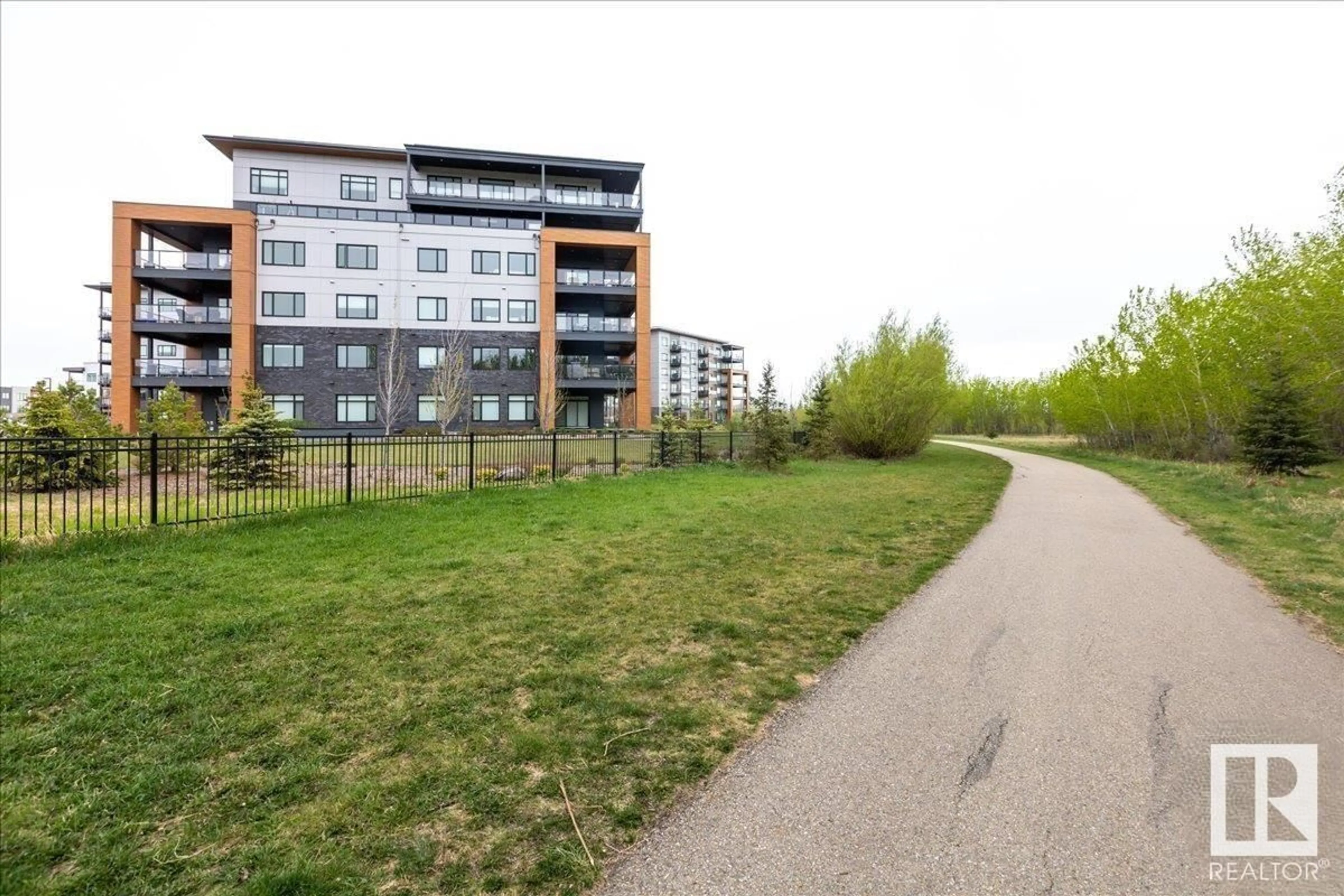 A pic from outside/outdoor area/front of a property/back of a property/a pic from drone, unknown for #317 - 7471 MAY CM, Edmonton Alberta T6R0X5