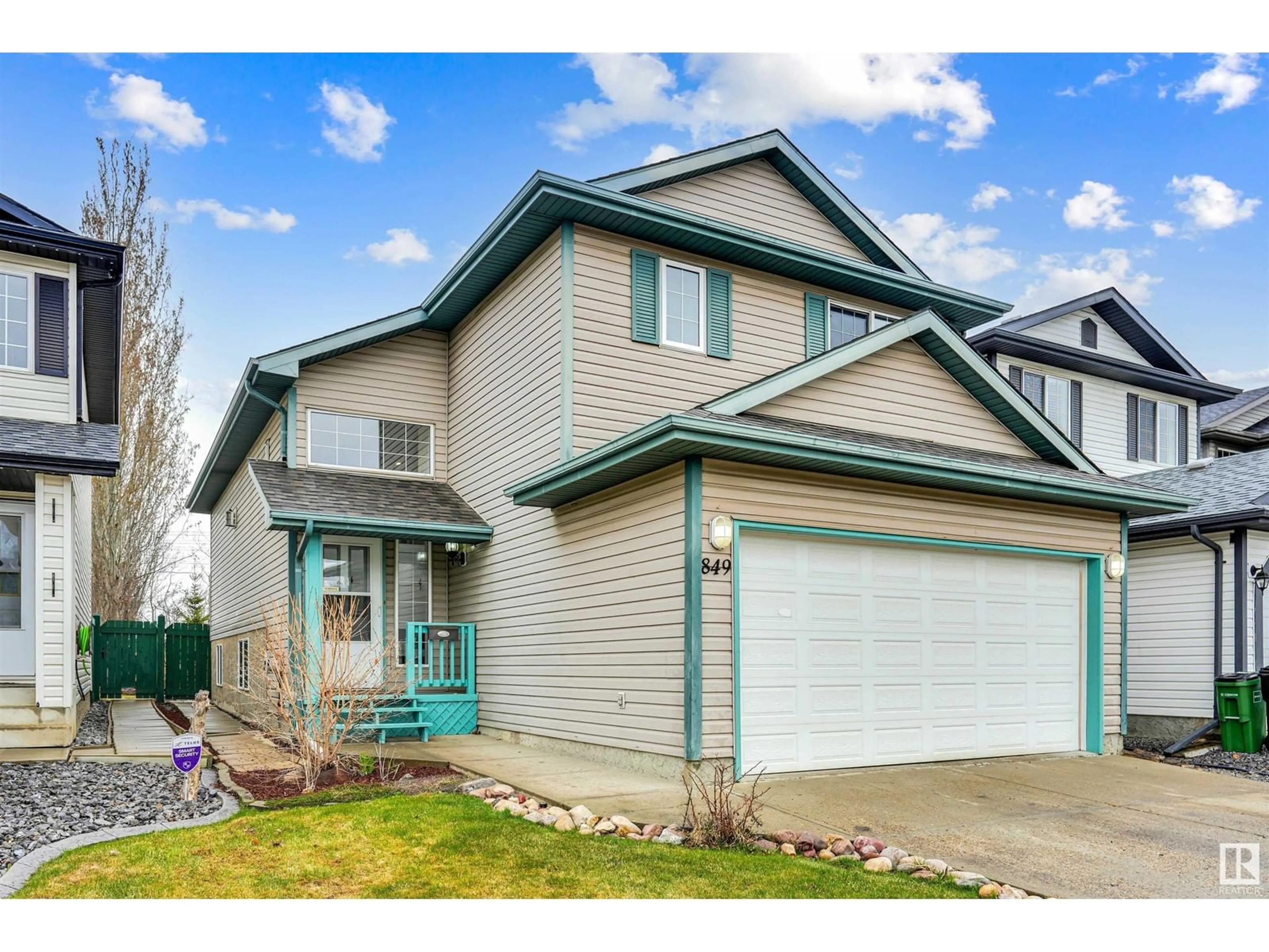 Home with vinyl exterior material, street for 849 BLACKLOCK WY, Edmonton Alberta T6W1C6
