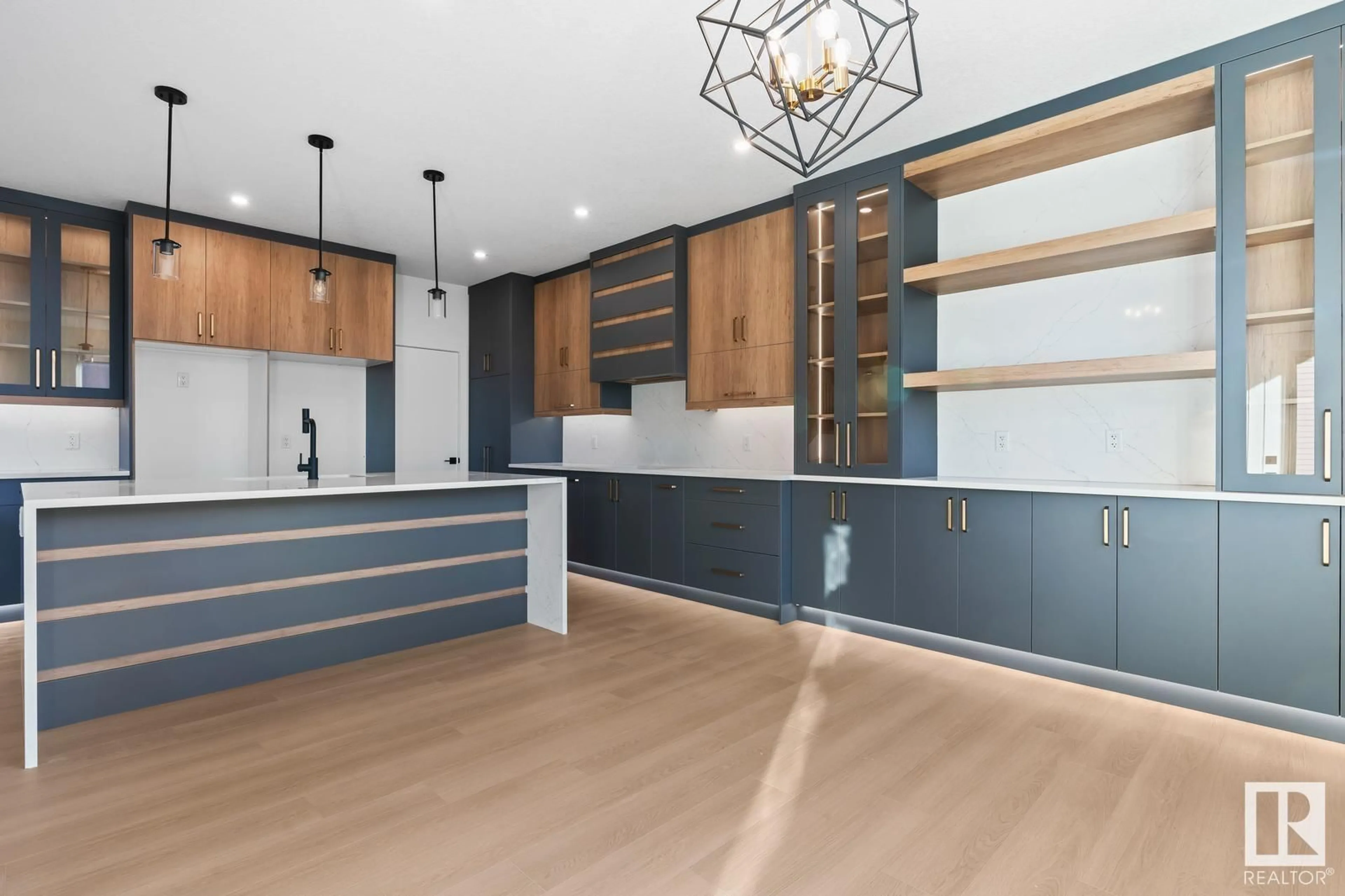 Open concept kitchen, wood/laminate floor for 139 CREEKSIDE LN, Leduc Alberta T9E1T1