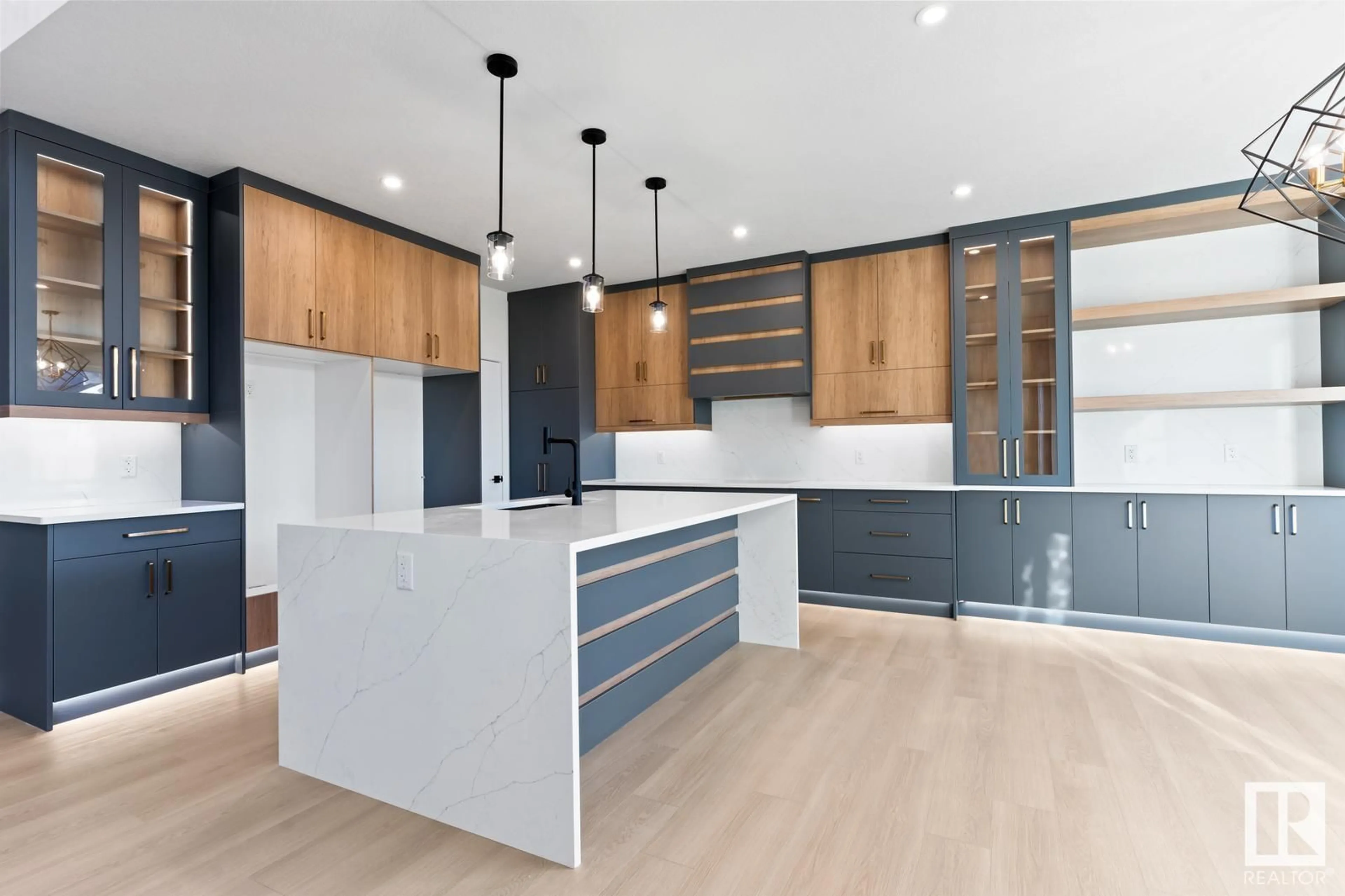Contemporary kitchen, wood/laminate floor for 139 CREEKSIDE LN, Leduc Alberta T9E1T1