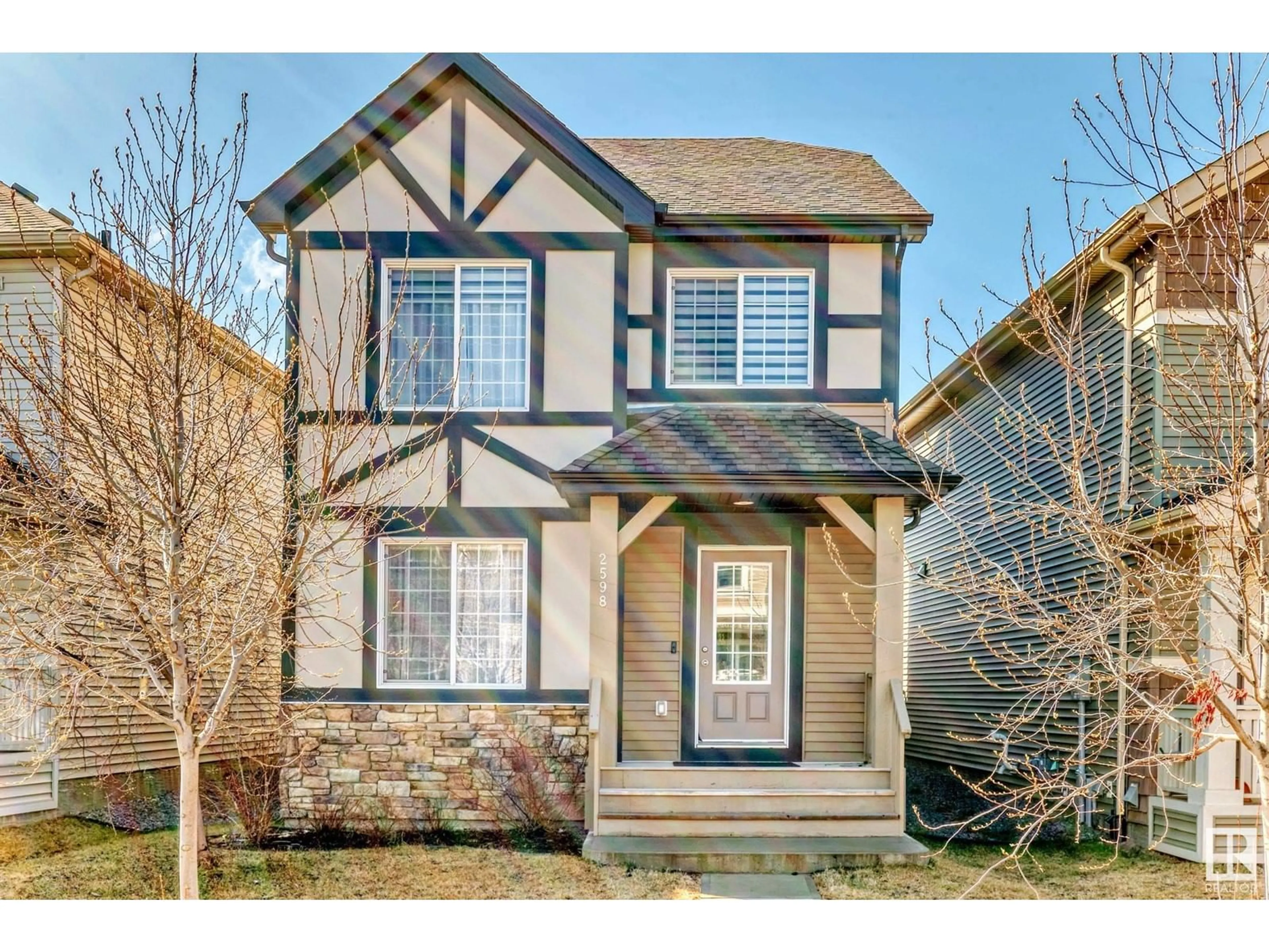 Home with vinyl exterior material, street for 2598 COUGHLAN RD, Edmonton Alberta T6W3S1
