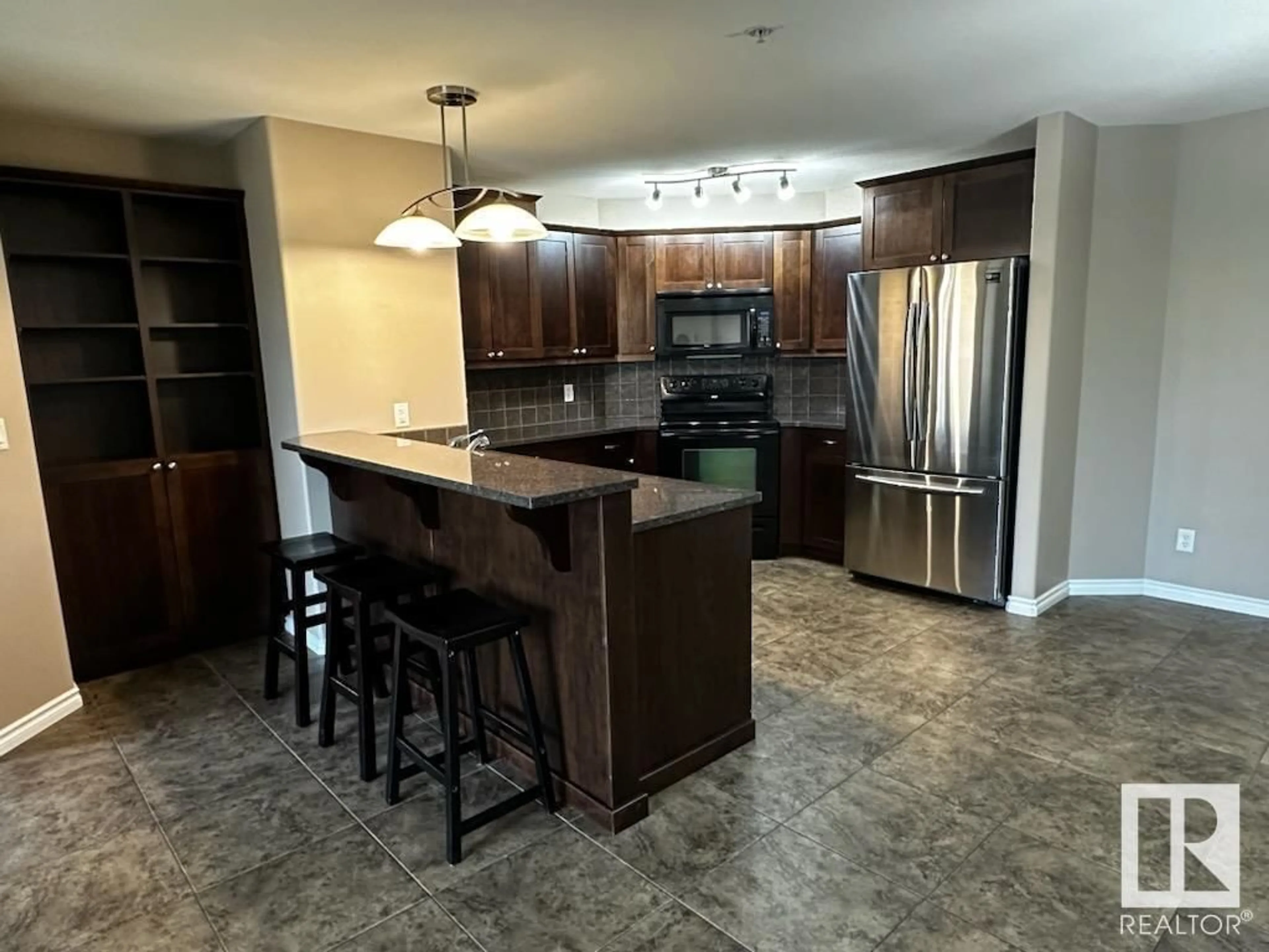 Open concept kitchen, ceramic/tile floor for 901 - 3303 16 ST, Cold Lake Alberta T9M0C3