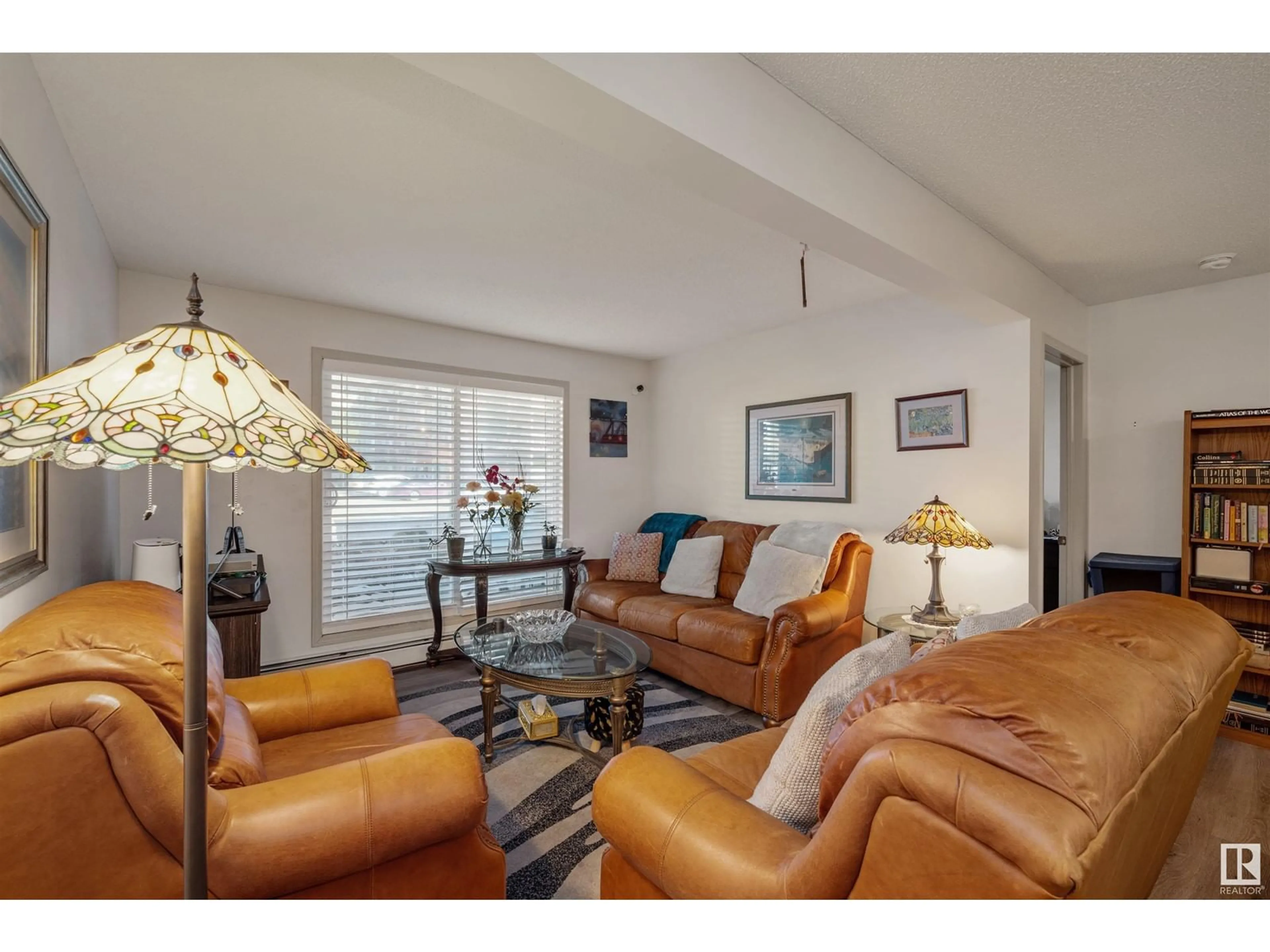 Living room with furniture, unknown for #109 - 309 CLAREVIEW STATION DR, Edmonton Alberta T5Y0C5