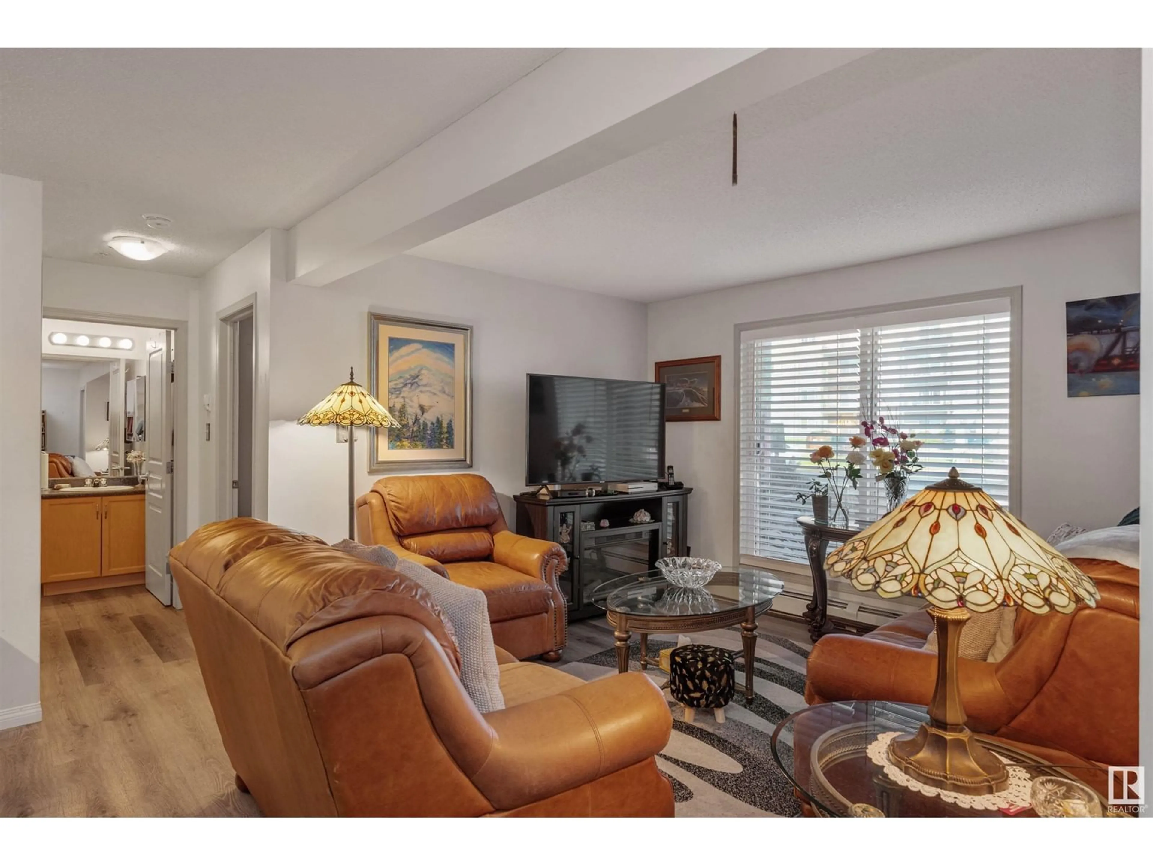 Living room with furniture, unknown for #109 - 309 CLAREVIEW STATION DR, Edmonton Alberta T5Y0C5