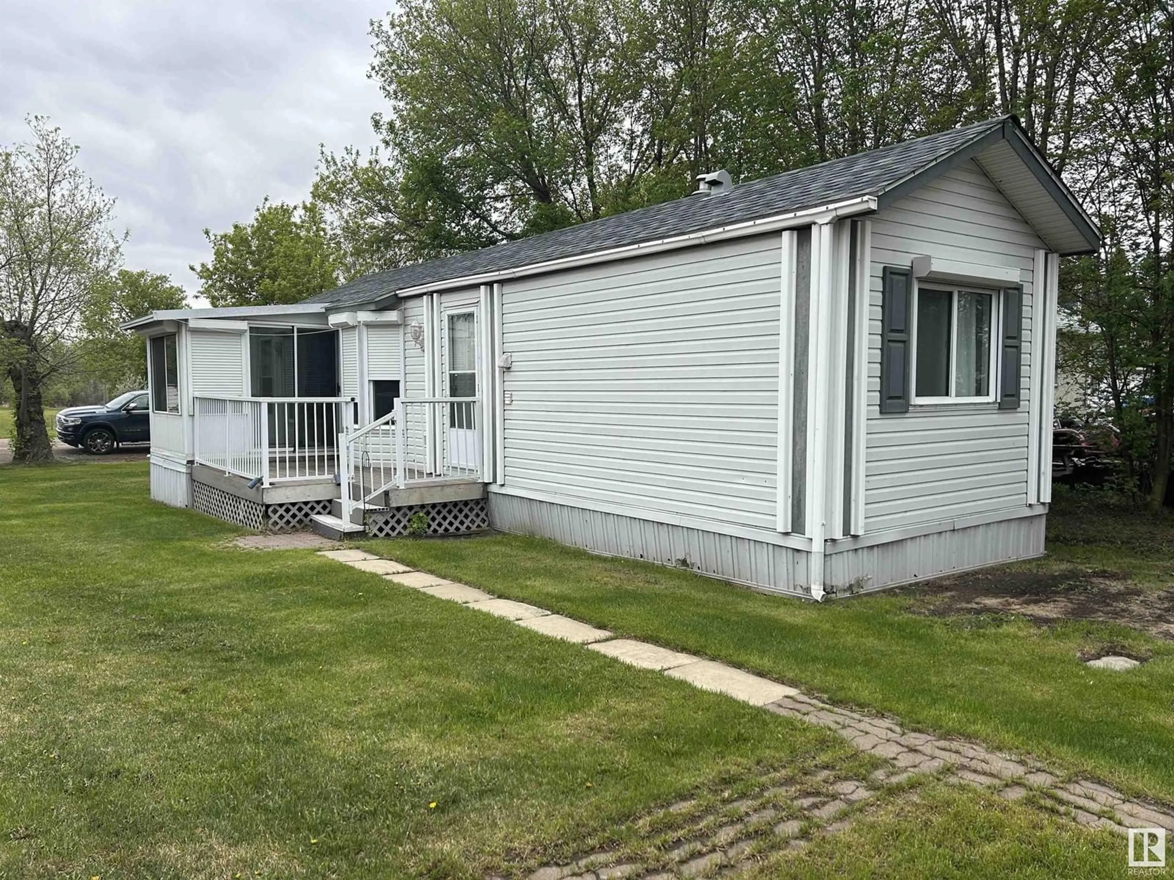Home with vinyl exterior material, street for 5026 50 AV, Warspite Alberta T0A2N0