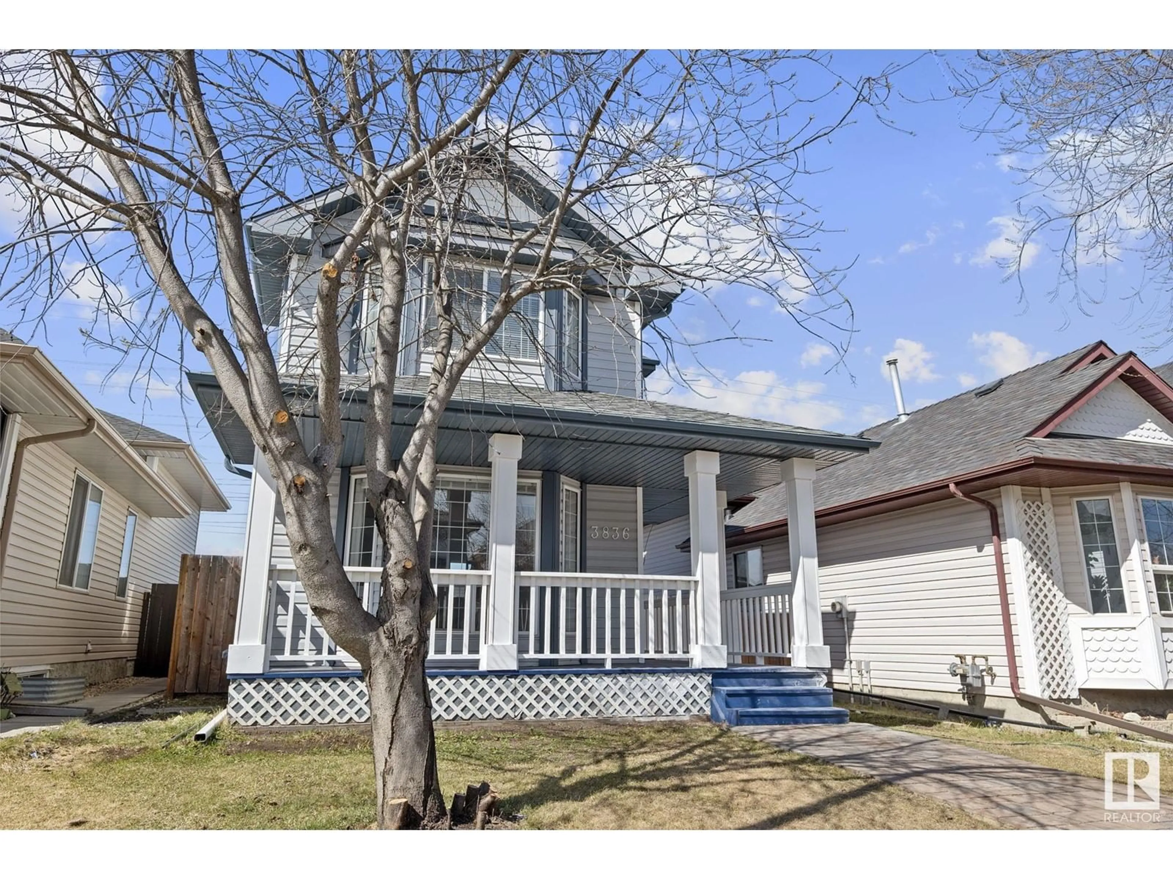 Home with vinyl exterior material, street for 3836 24 ST, Edmonton Alberta T6T1K6