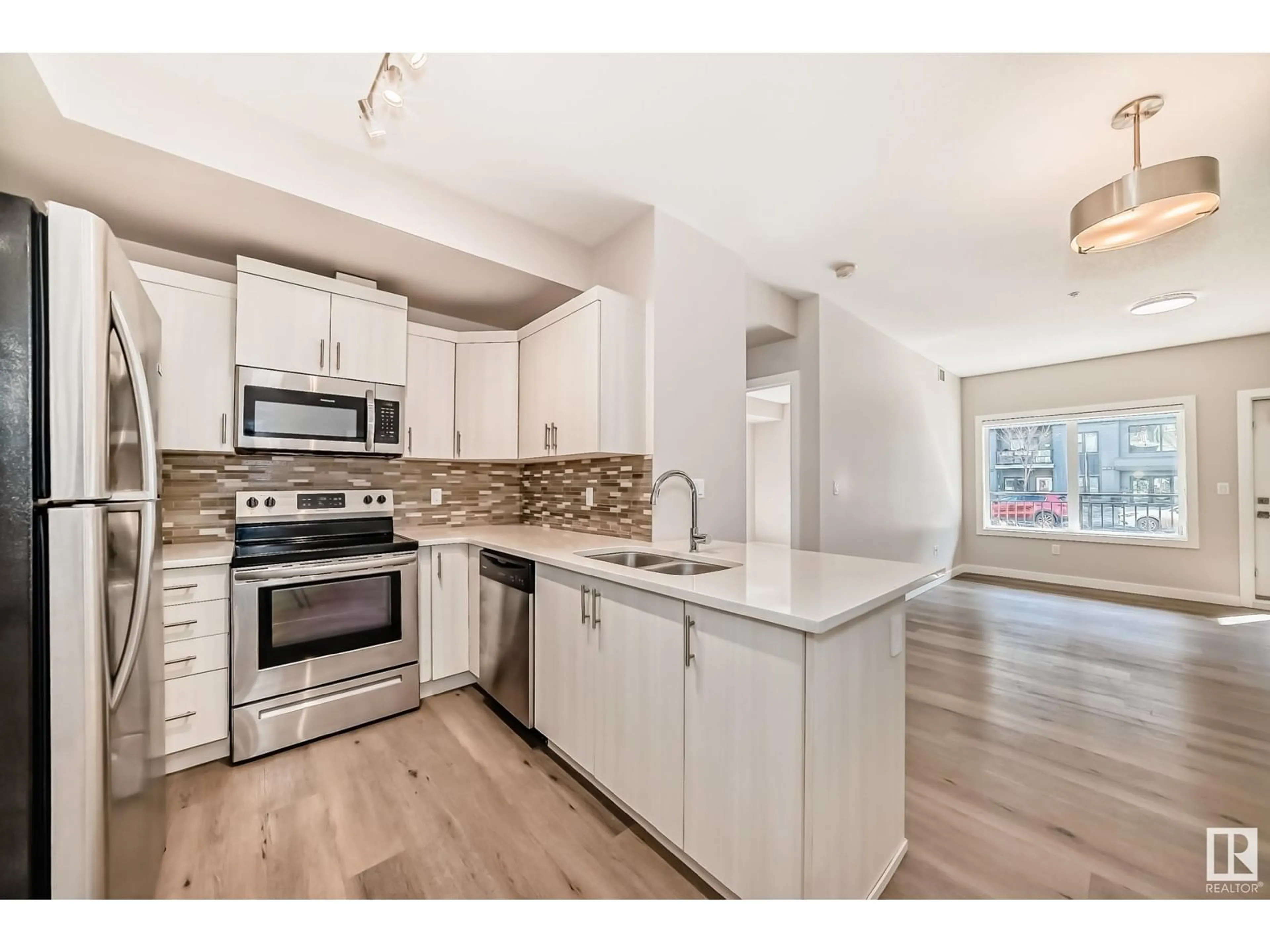 Open concept kitchen, unknown for 560 - 126 GRIESBACH PARADE PR, Edmonton Alberta T5E6X1