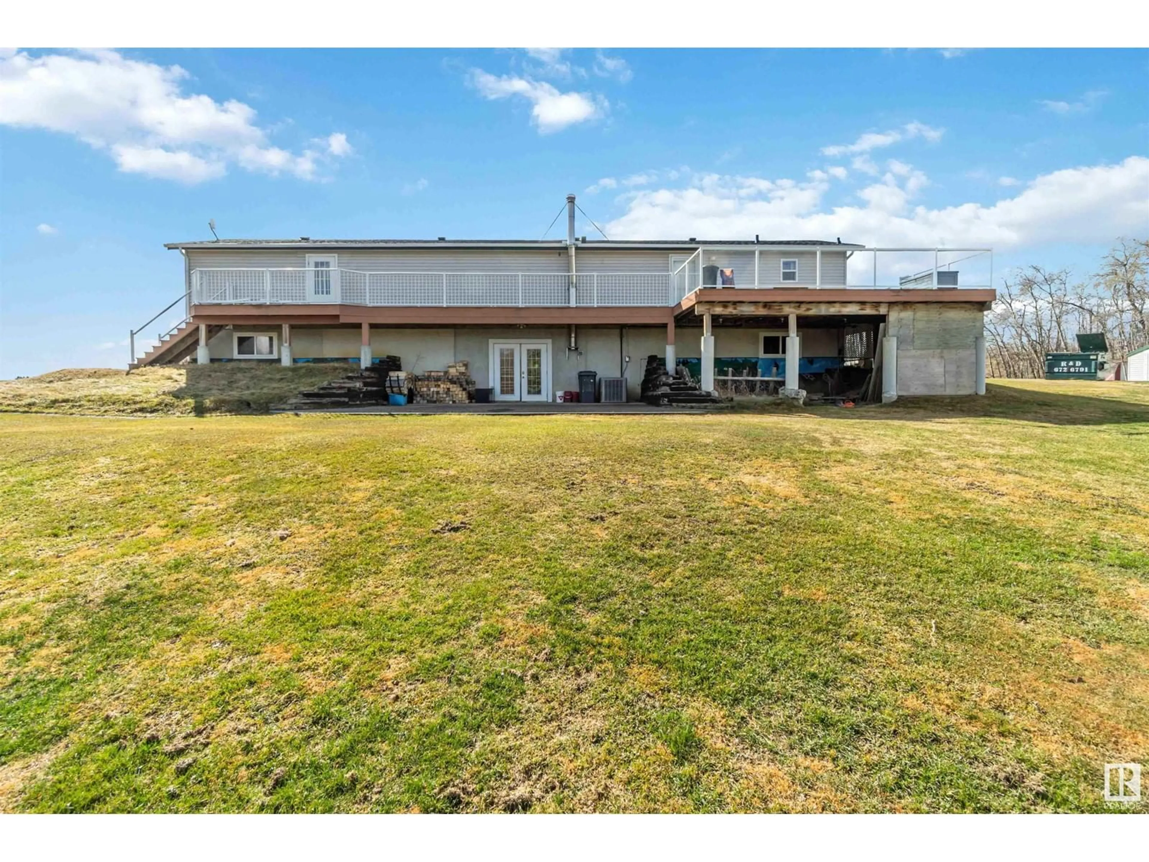 A pic from outside/outdoor area/front of a property/back of a property/a pic from drone, building for 23244 TWP ROAD 484, Rural Leduc County Alberta T4X1X1
