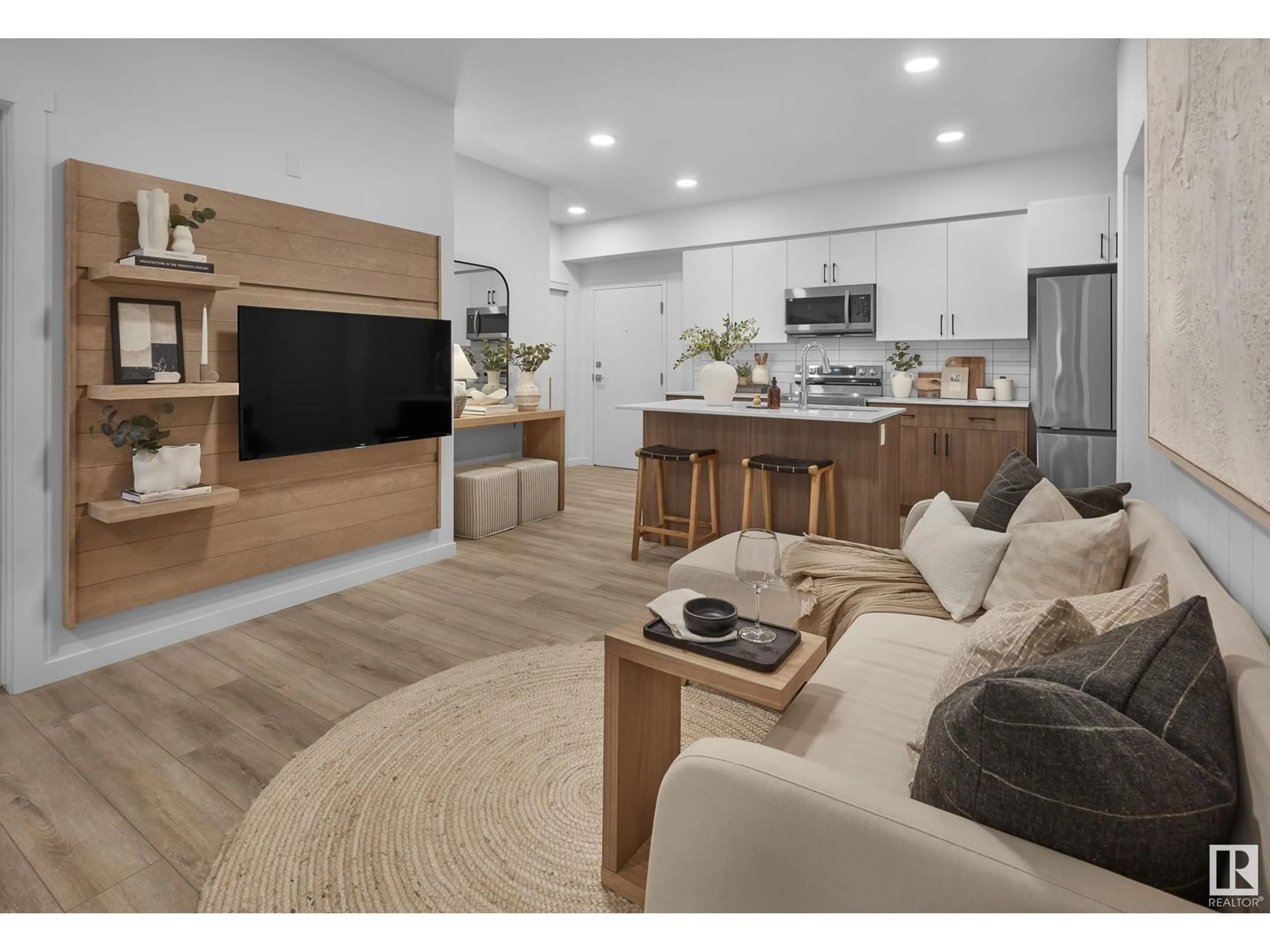 Living room with furniture, wood/laminate floor for #104 - 3715 141 ST, Edmonton Alberta T6W5M9