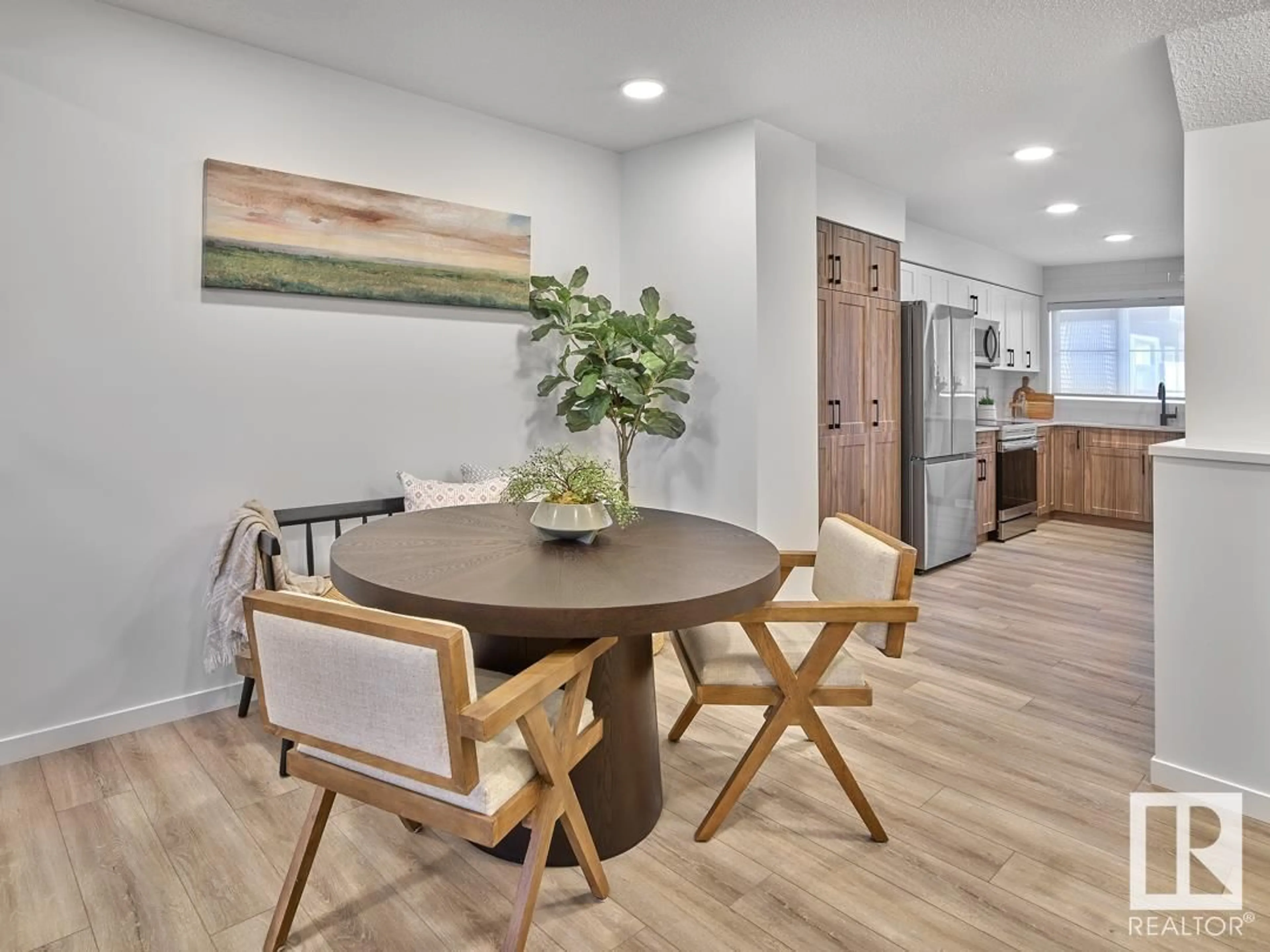 Open concept kitchen, wood/laminate floor for 3 - 1215 KESWICK DR, Edmonton Alberta T6W4J5