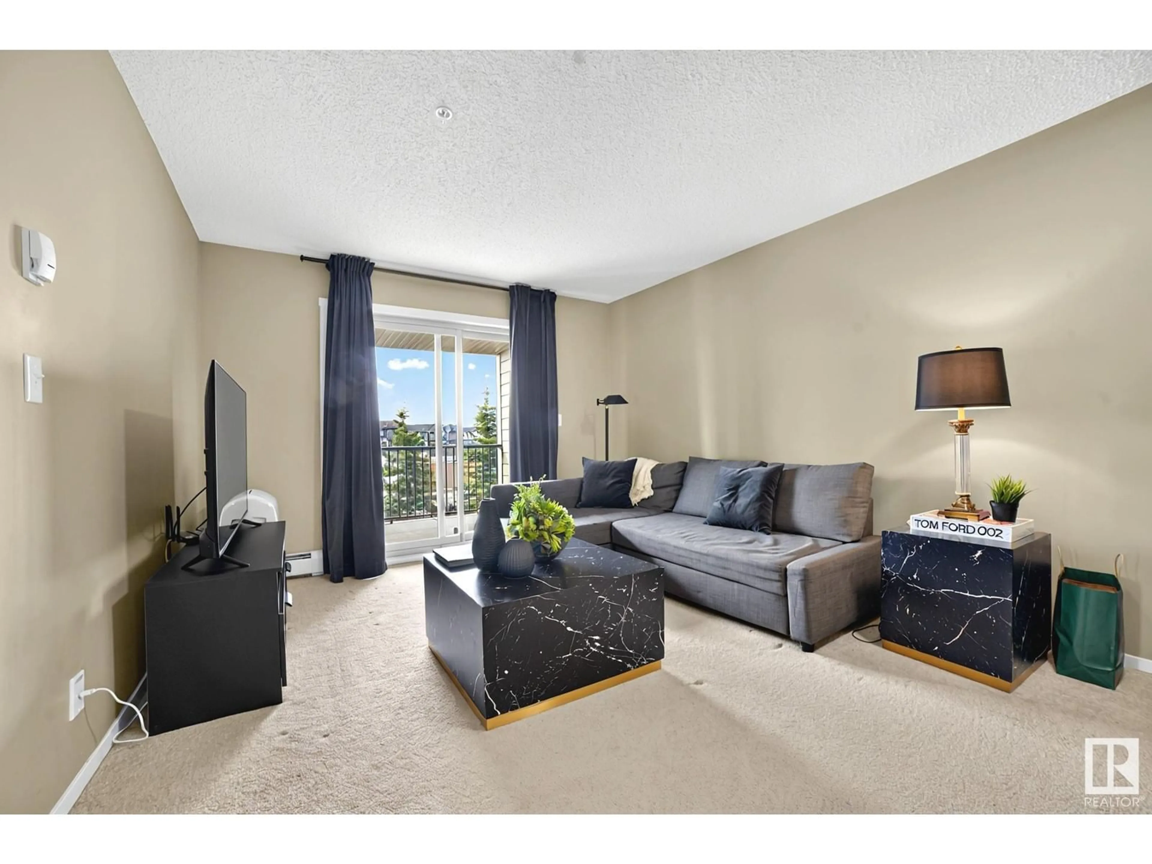 Living room with furniture, carpet floor for 209 - 111 WATT CM, Edmonton Alberta T6X2C6