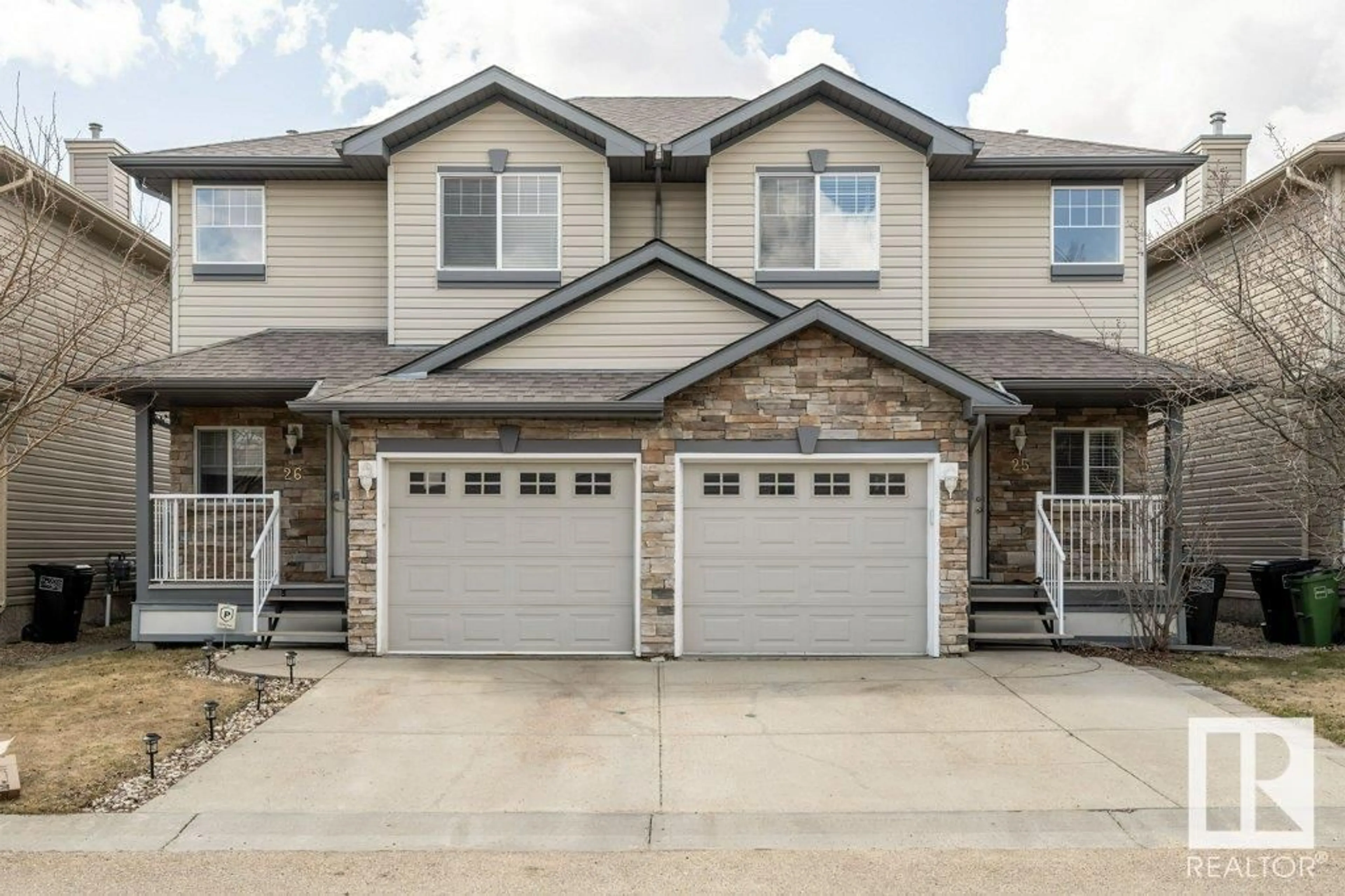 Home with vinyl exterior material, street for #25 - 12104 16 AV, Edmonton Alberta T6W1X3