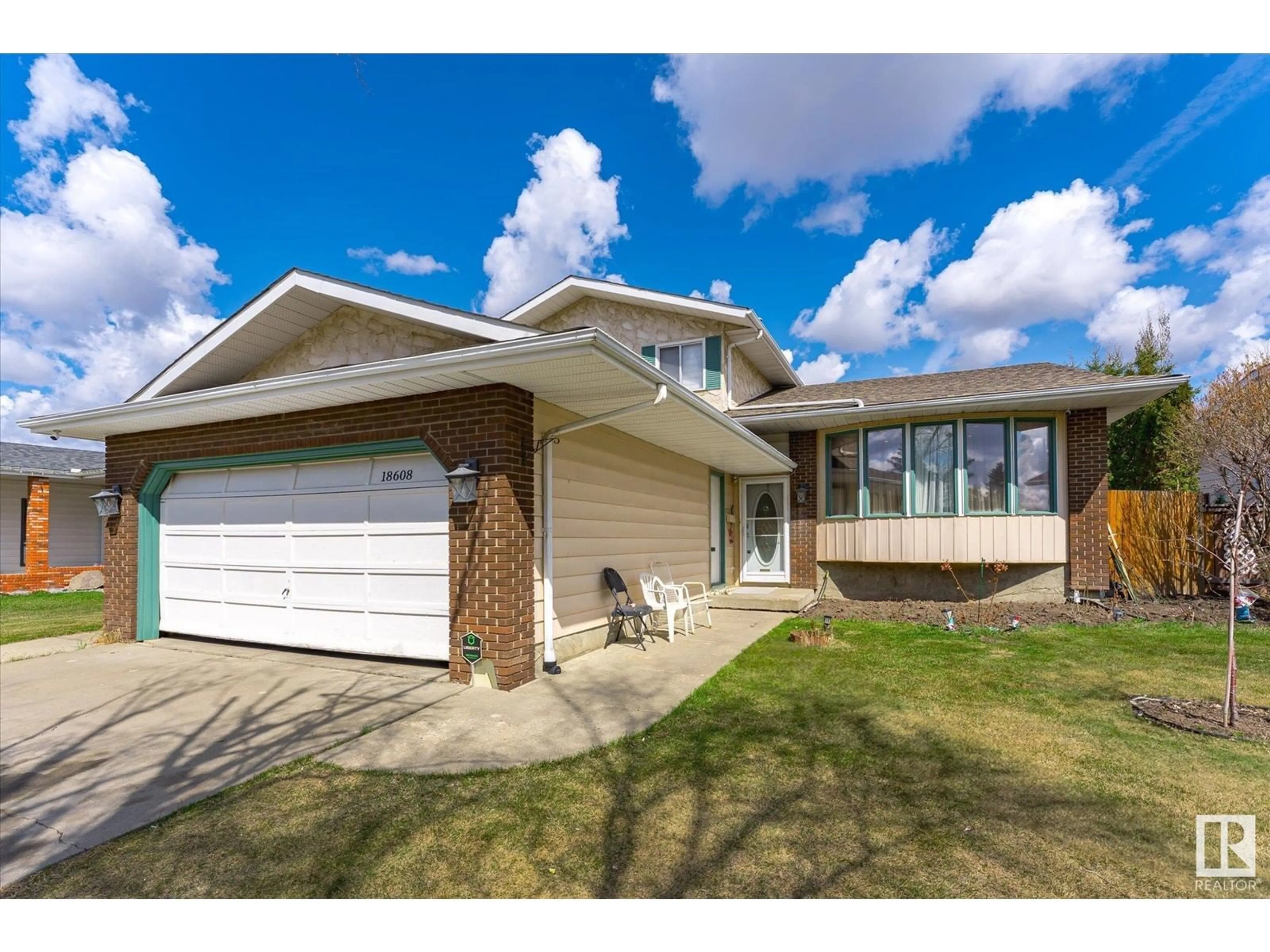 Home with vinyl exterior material, street for NW - 18608 89 AV, Edmonton Alberta T5T1N5