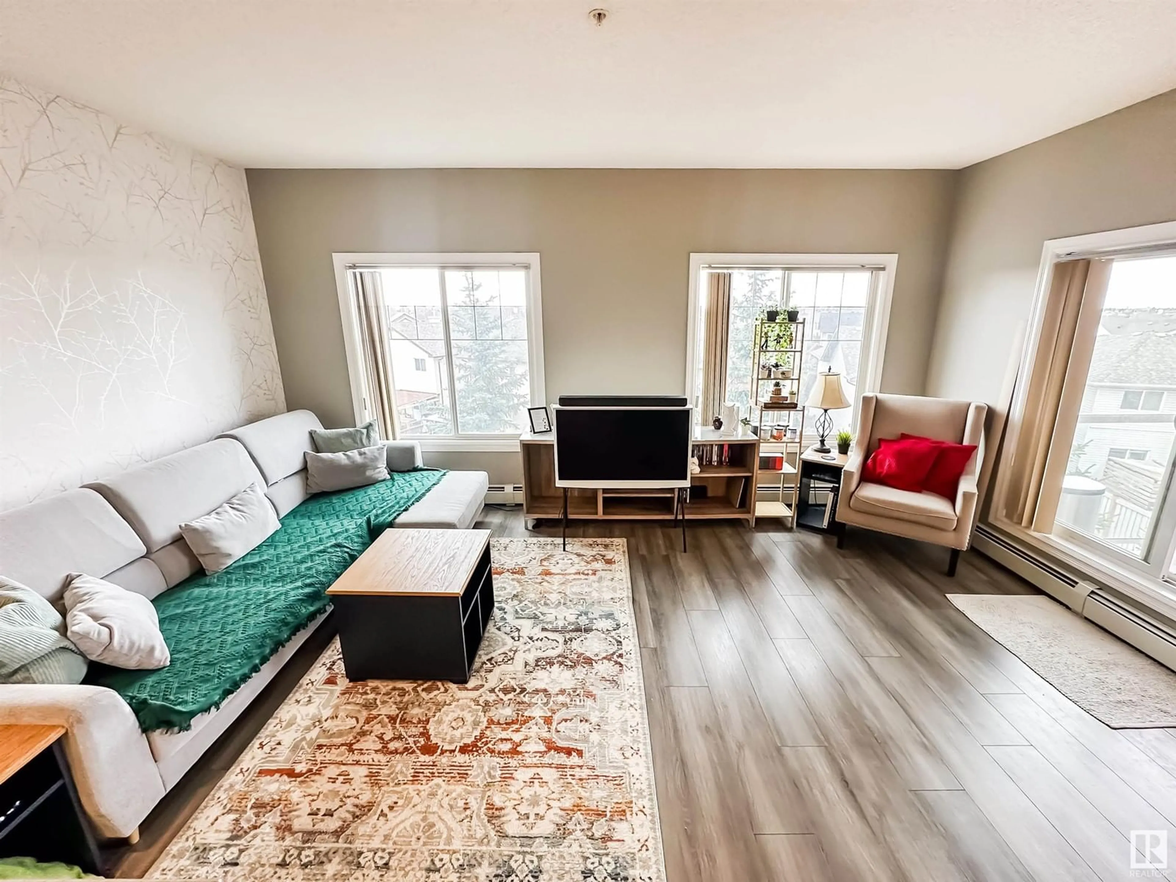 Living room with furniture, unknown for 226 - 323 MACEWAN RD, Edmonton Alberta T6W0C5