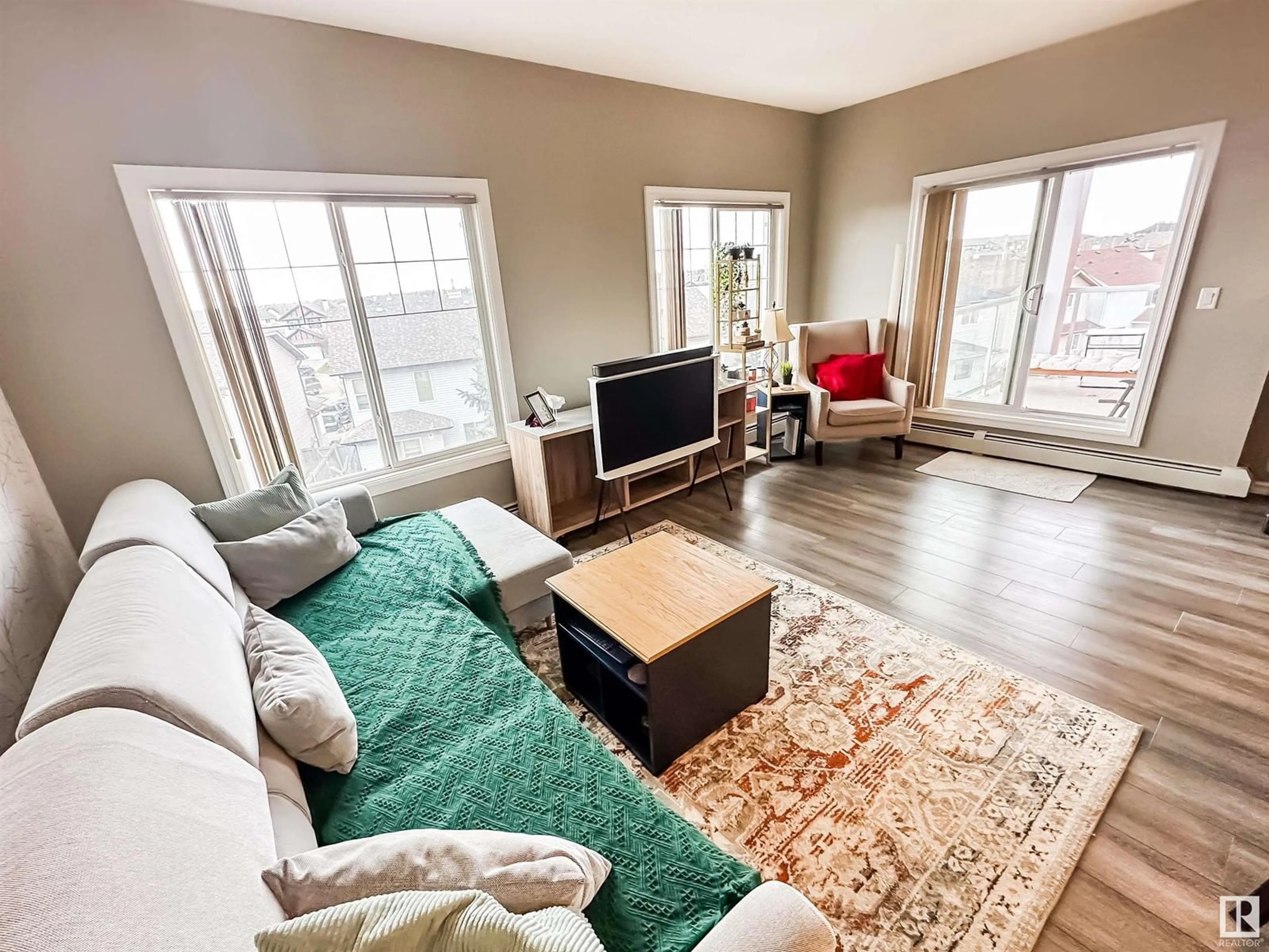 Living room with furniture, unknown for 226 - 323 MACEWAN RD, Edmonton Alberta T6W0C5