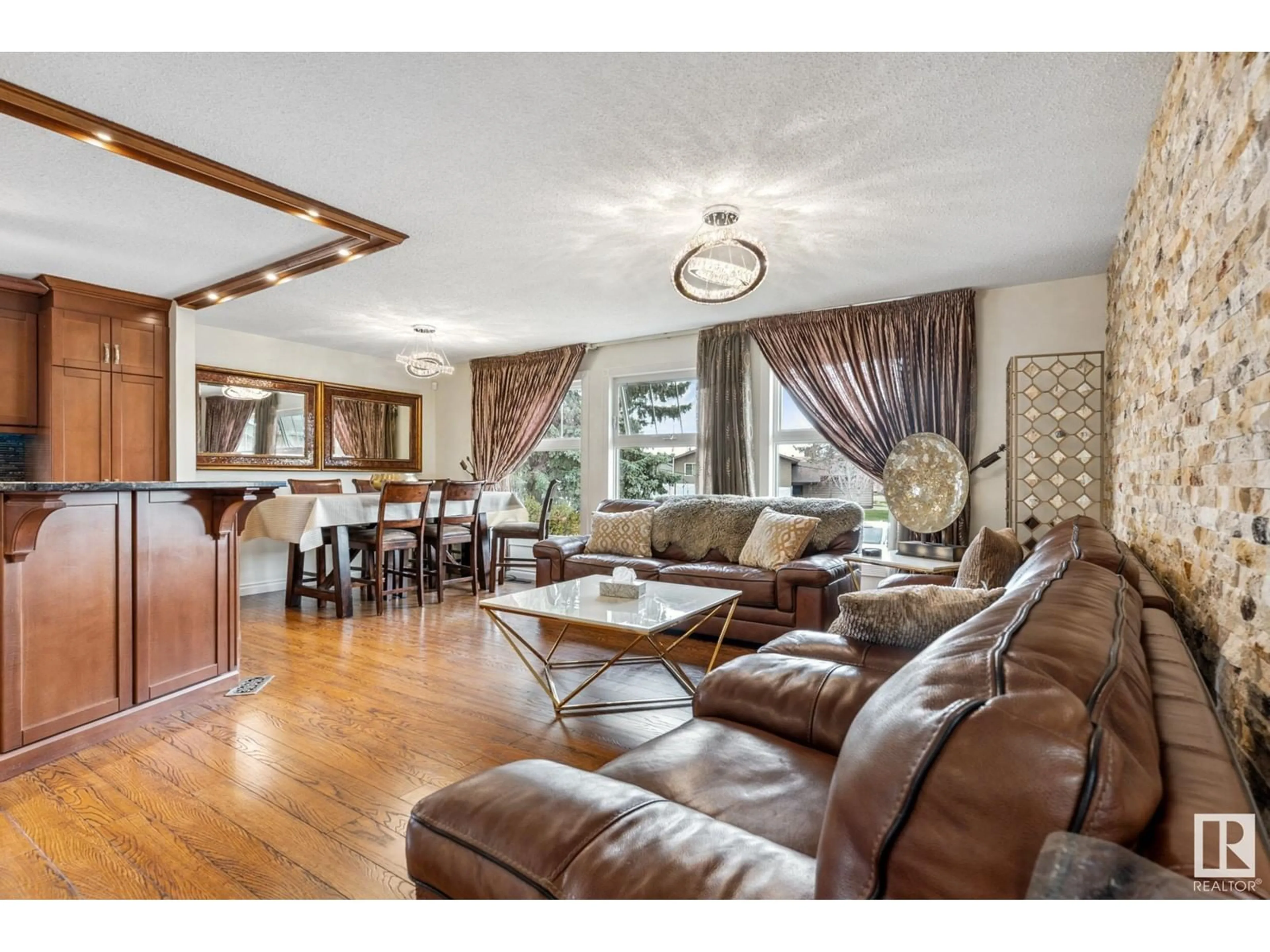 Living room with furniture, wood/laminate floor for 285 WARWICK RD, Edmonton Alberta T5X4R1