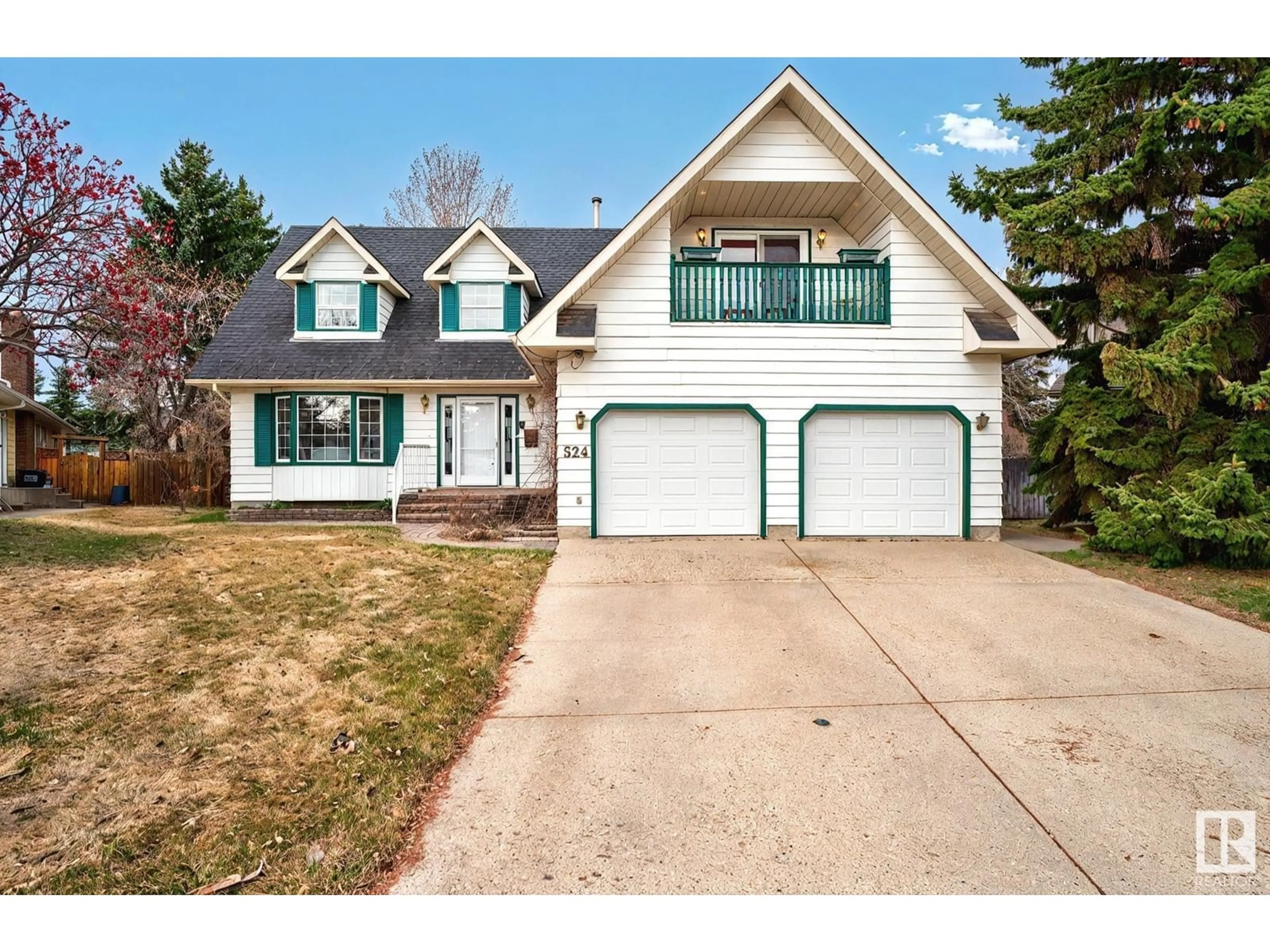 Home with vinyl exterior material, street for 524 WAHSTAO RD, Edmonton Alberta T5T2Y1