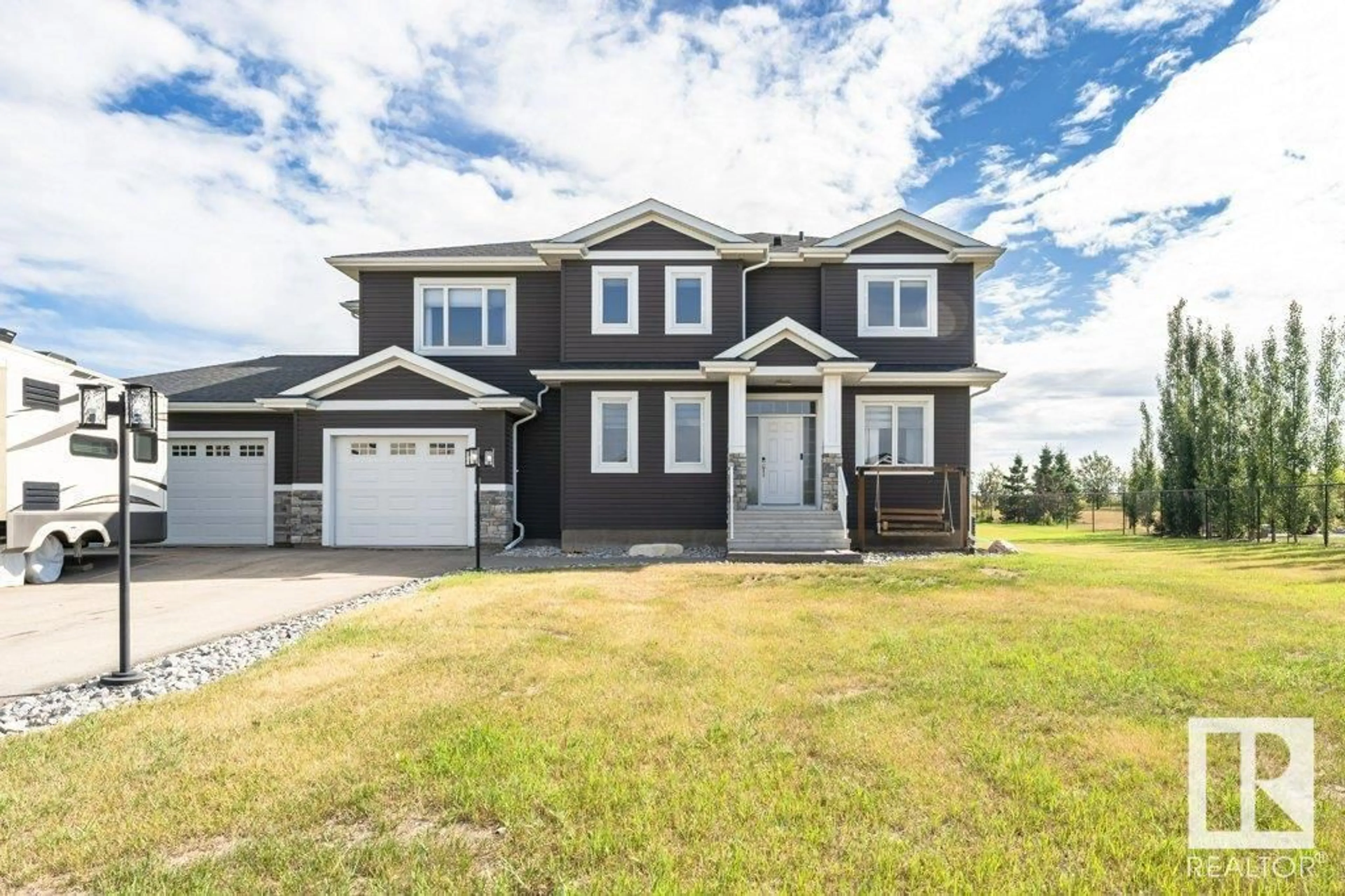 Home with vinyl exterior material, street for 20-26409 TWP 532A RD, Rural Parkland County Alberta T7X0W7