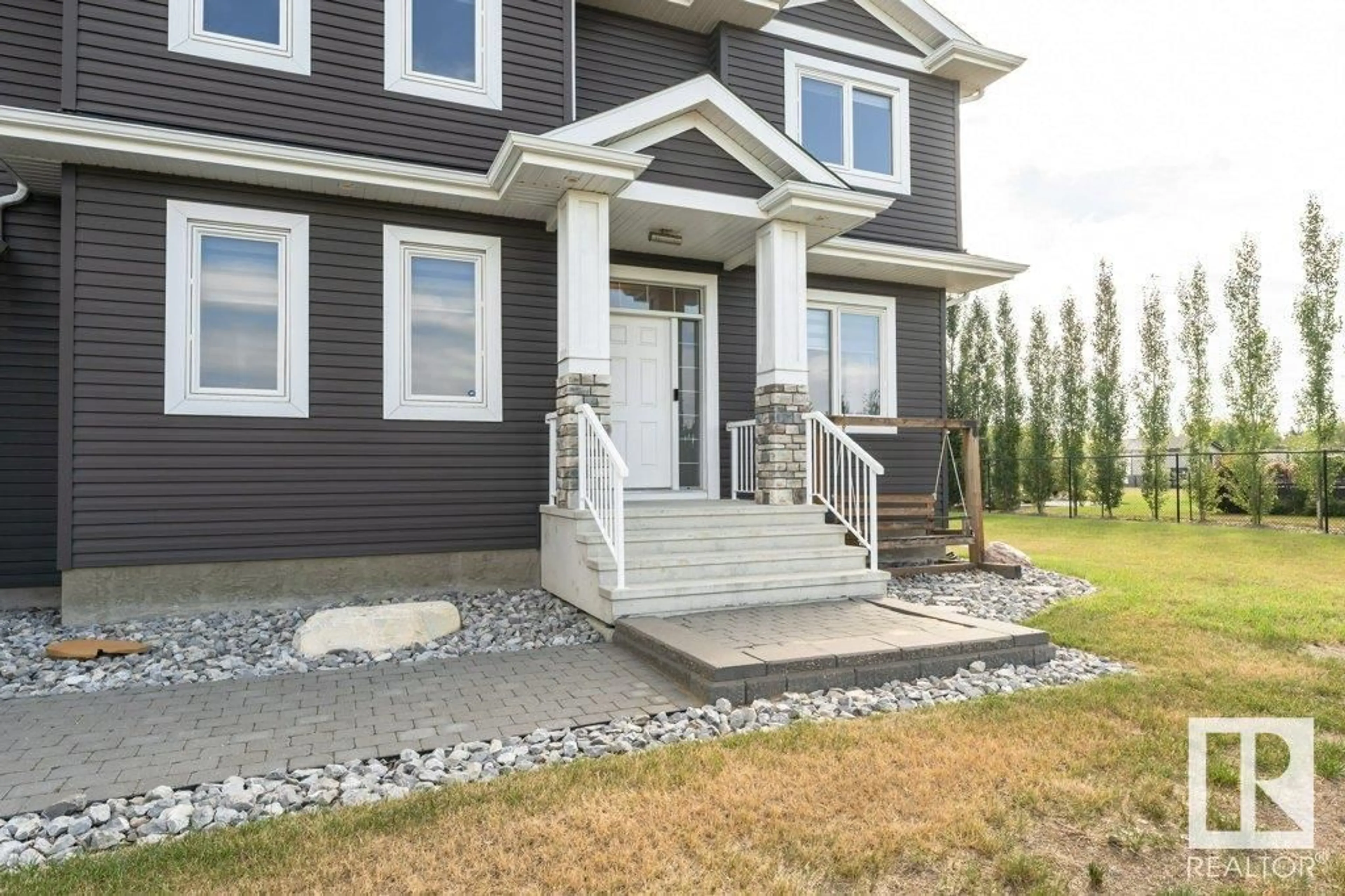 Home with vinyl exterior material, street for 20-26409 TWP 532A RD, Rural Parkland County Alberta T7X0W7