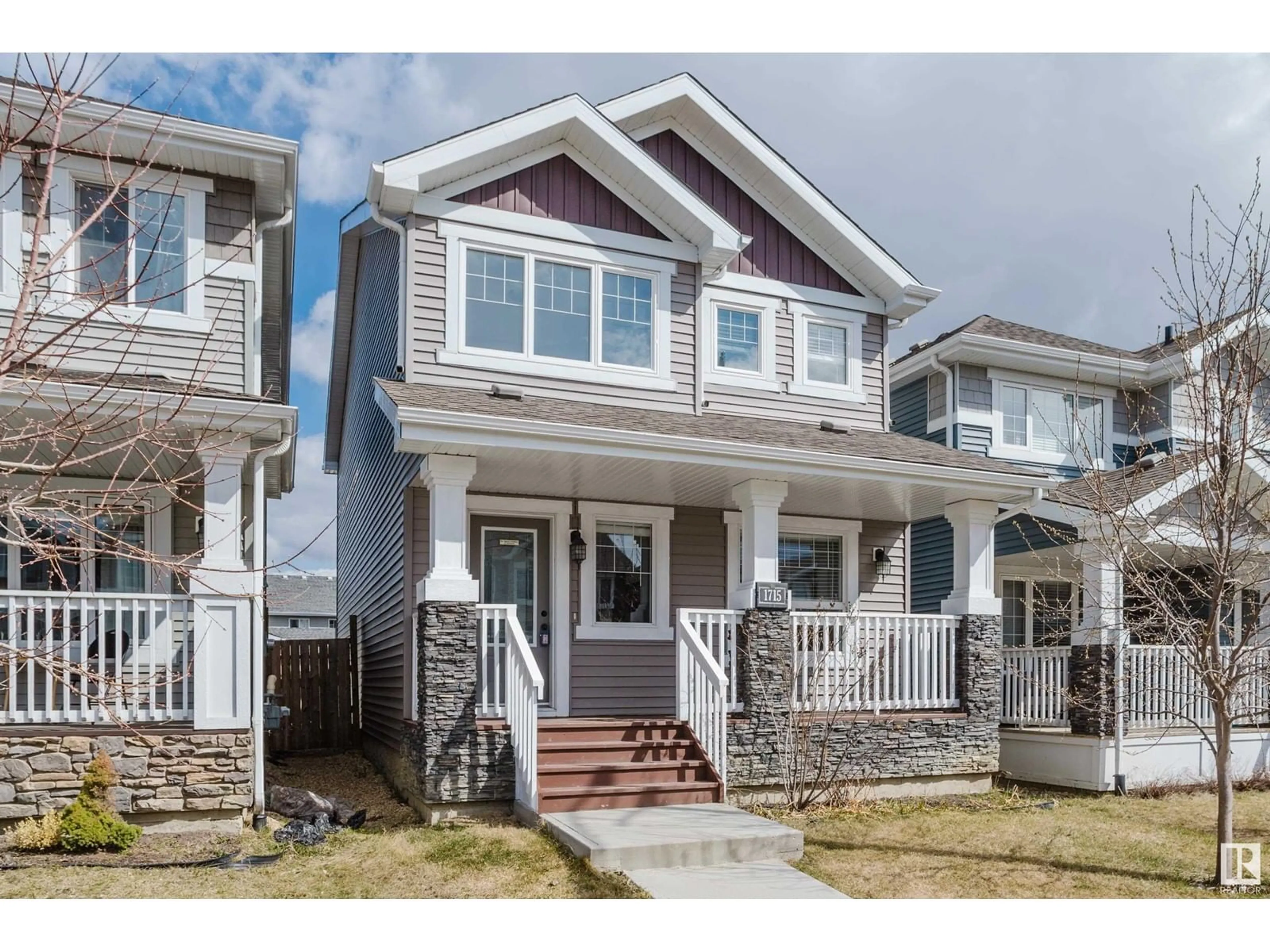 Home with vinyl exterior material, street for SW - 1715 167 ST, Edmonton Alberta T6W3C5