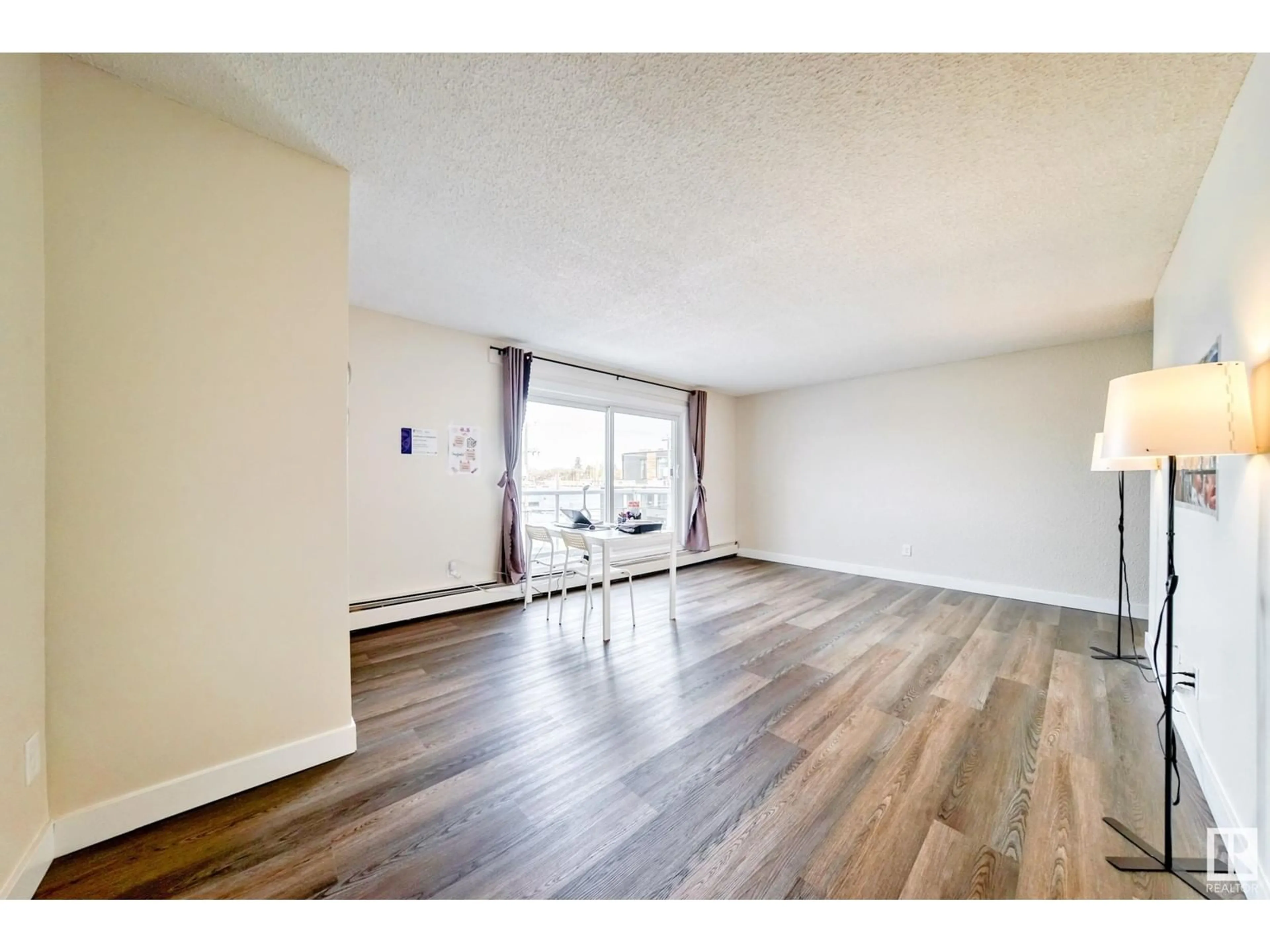 A pic of a room for #404 - 10624 123 ST, Edmonton Alberta T5N1P2