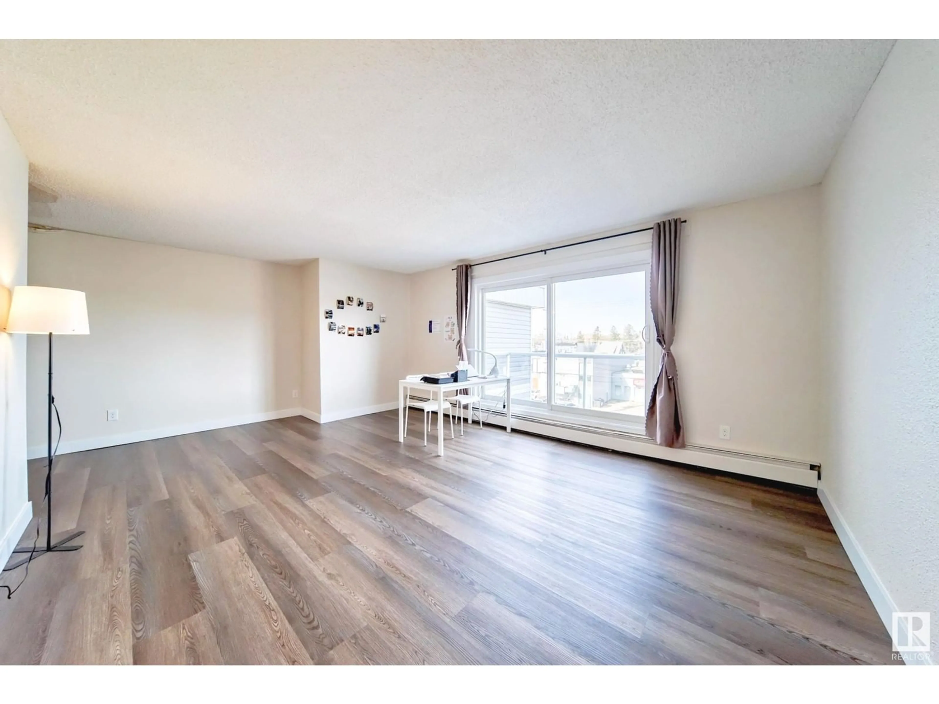 A pic of a room for #404 - 10624 123 ST, Edmonton Alberta T5N1P2