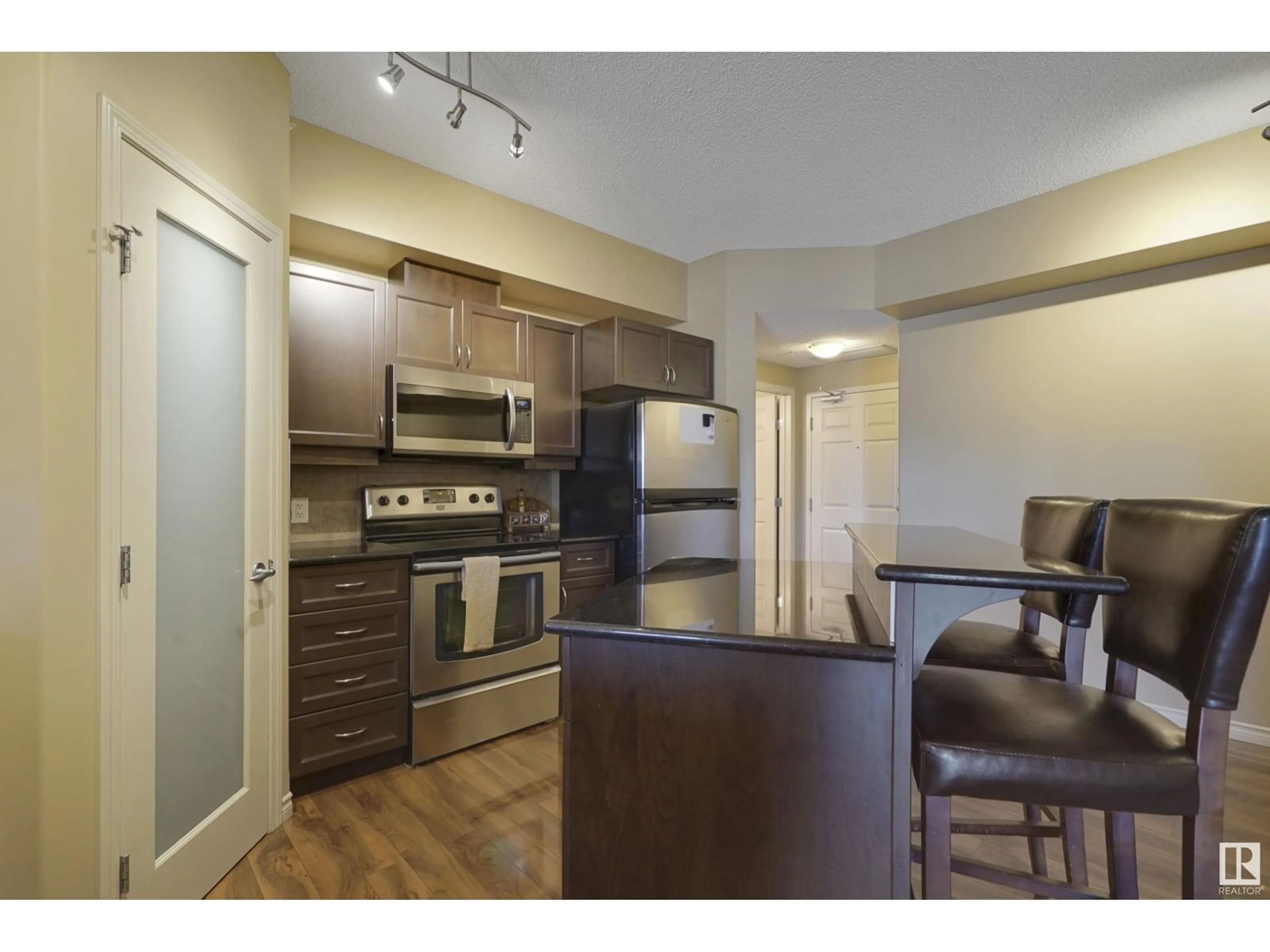 Standard kitchen, wood/laminate floor for 511 10303 111 ST NW, Edmonton Alberta T5K0C6