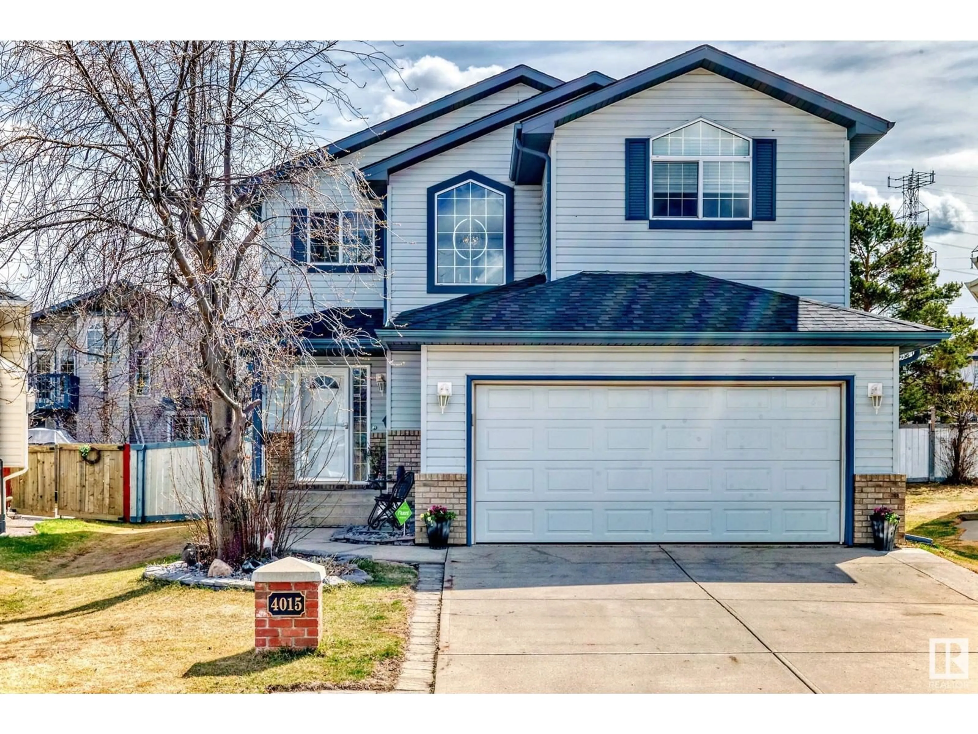 Home with vinyl exterior material, street for NW - 4015 28A ST, Edmonton Alberta T6T1L8
