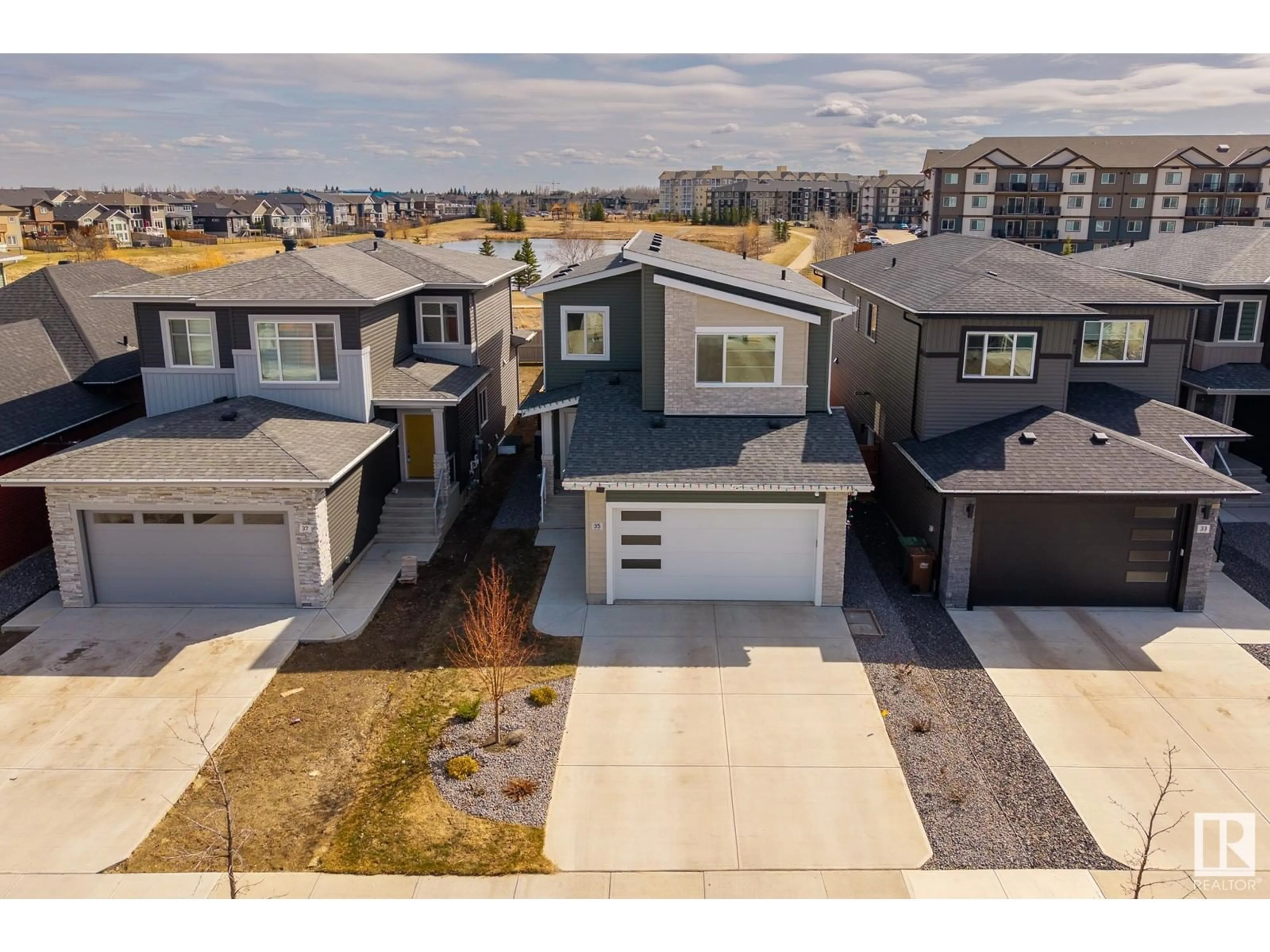 A pic from outside/outdoor area/front of a property/back of a property/a pic from drone, street for 35 ENCORE CR, St. Albert Alberta T8N7W2