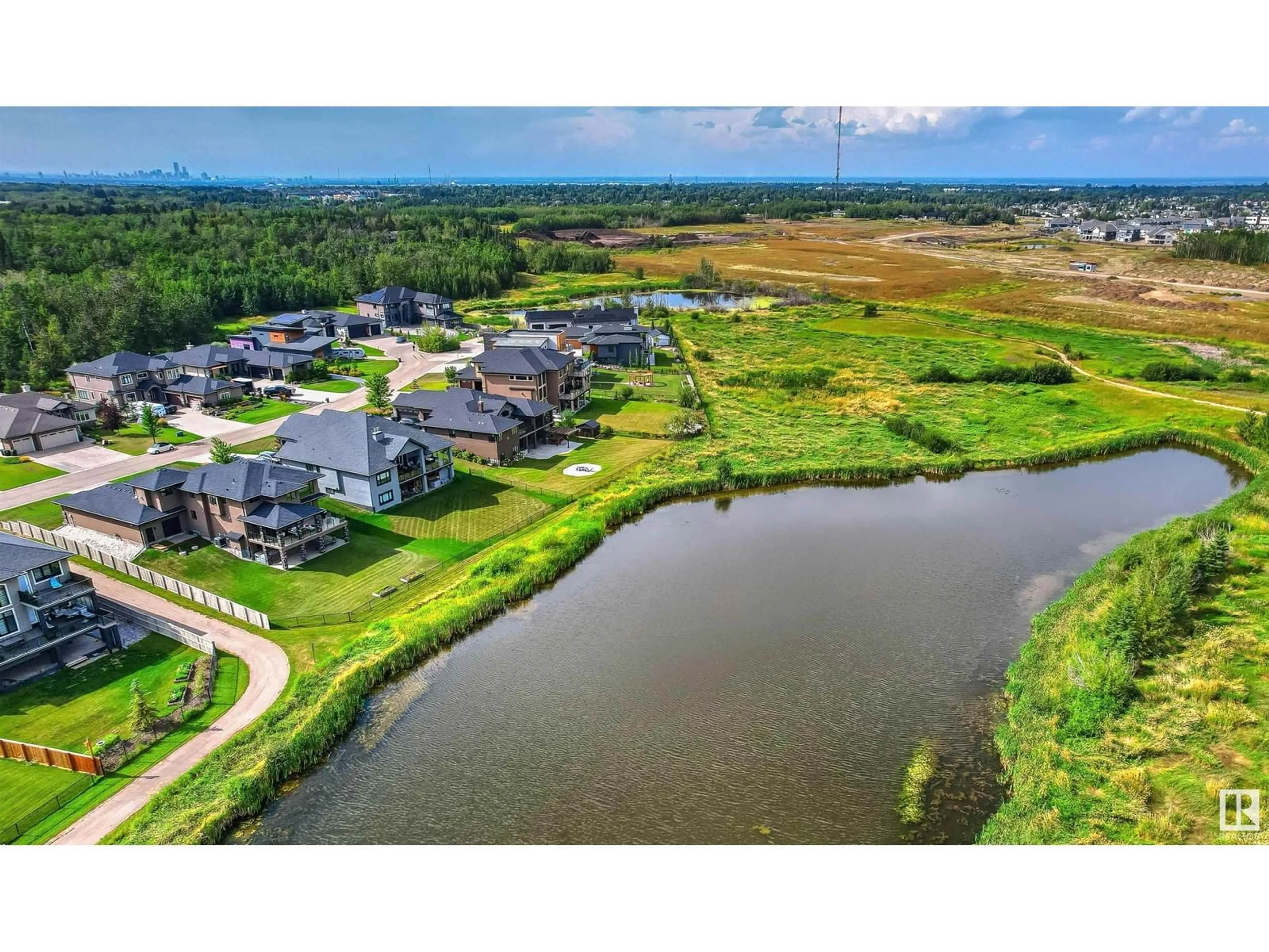 A pic from outside/outdoor area/front of a property/back of a property/a pic from drone, water/lake/river/ocean view for 52320 - 59 RGE ROAD 231, Rural Strathcona County Alberta T8B1A9