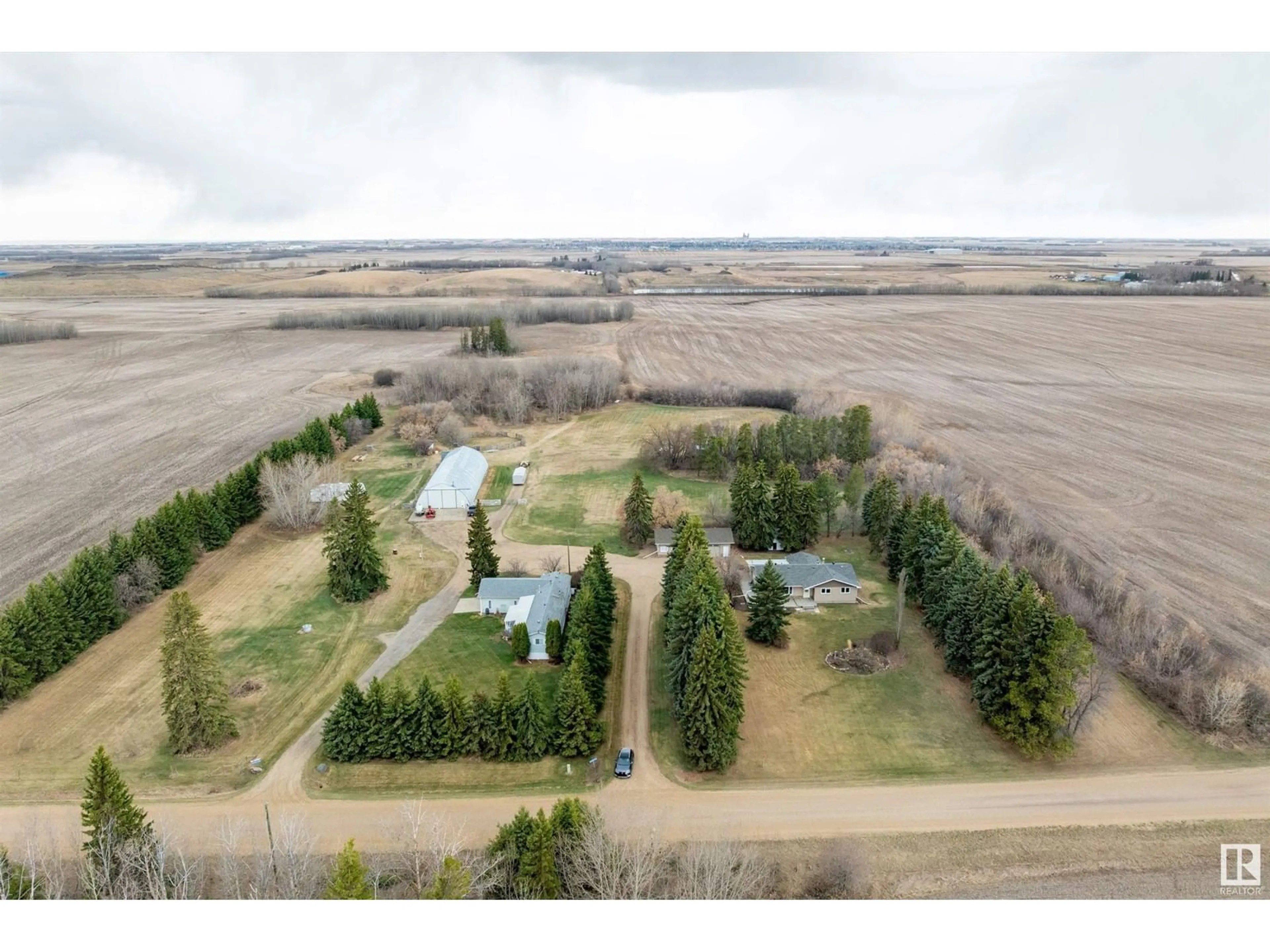 A pic from outside/outdoor area/front of a property/back of a property/a pic from drone, unknown for 55518 & 55516 RGE ROAD 250, Rural Sturgeon County Alberta T8R1P4