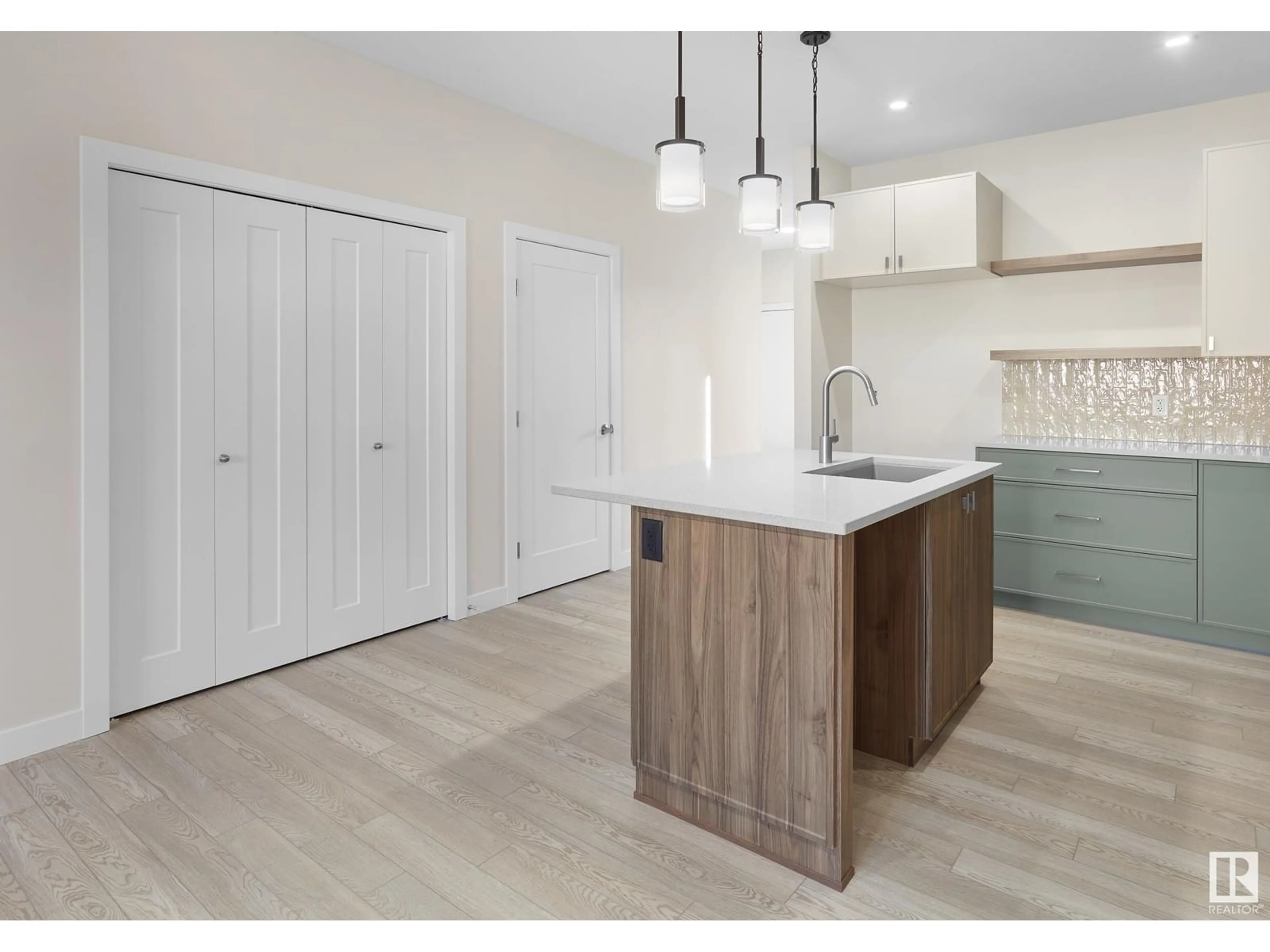 Open concept kitchen, wood/laminate floor for 9344 221 ST, Edmonton Alberta T5T6C9