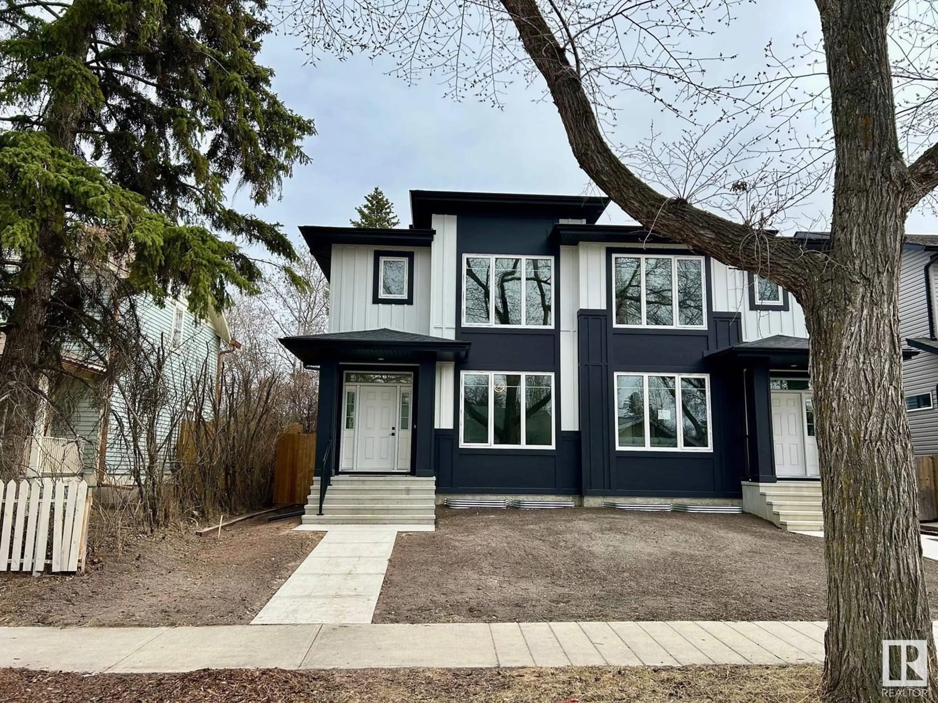 Home with brick exterior material, street for NW - 11219 125 ST, Edmonton Alberta T5M0M6