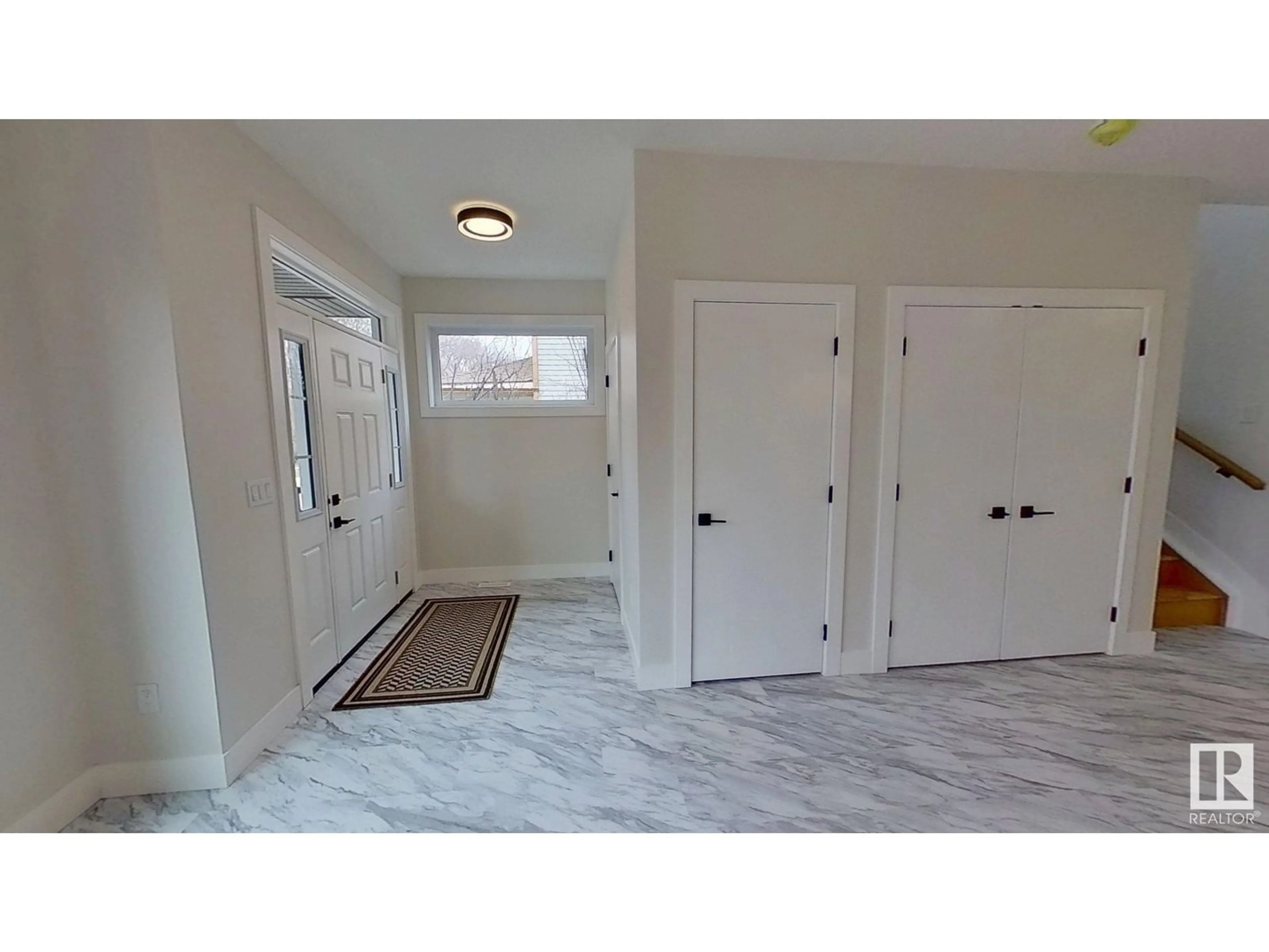 Indoor entryway for NW - 11219 125 ST, Edmonton Alberta T5M0M6